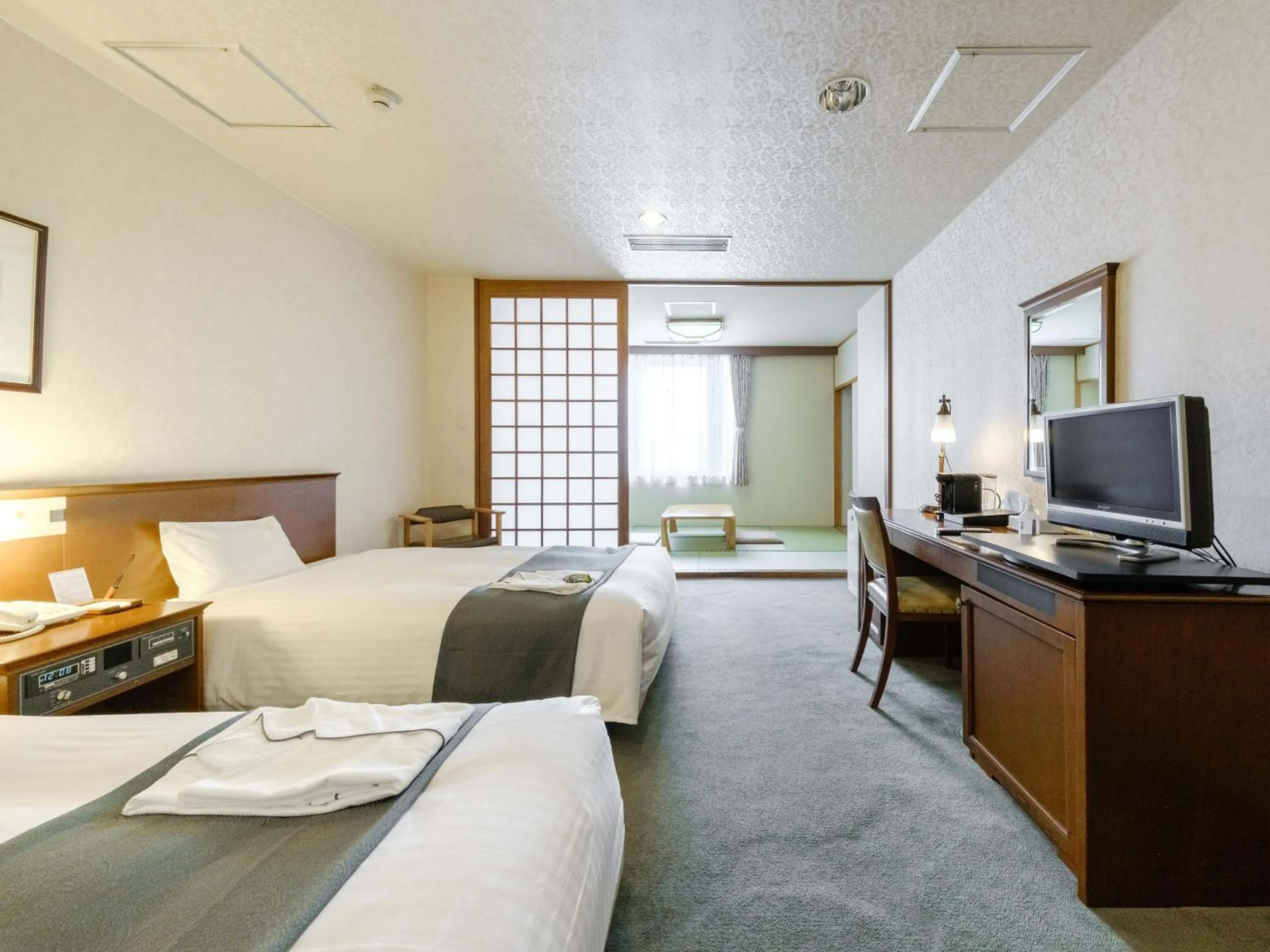 Bed in Tabist Abashiri Central Hotel