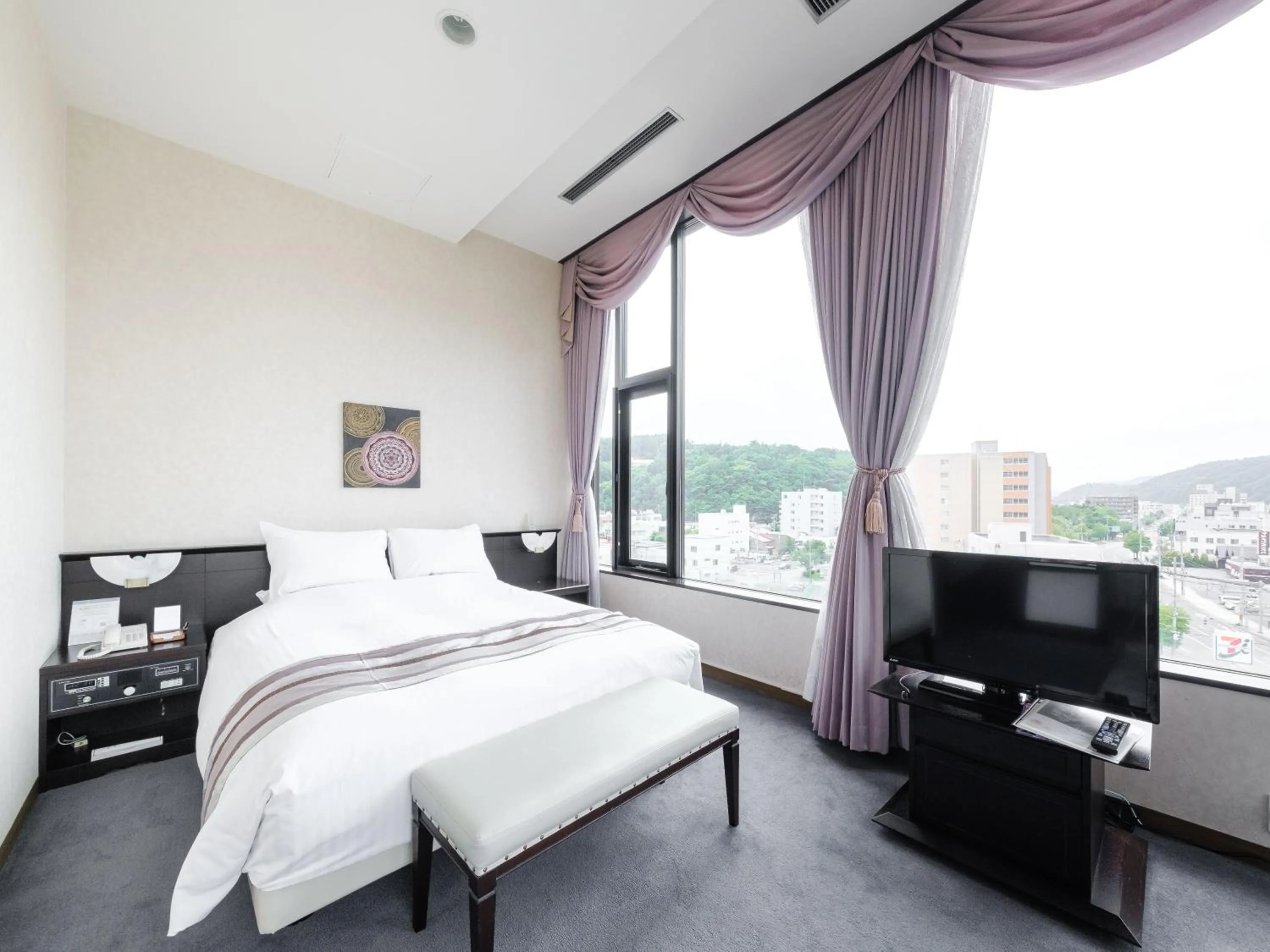 Bed in Tabist Abashiri Central Hotel