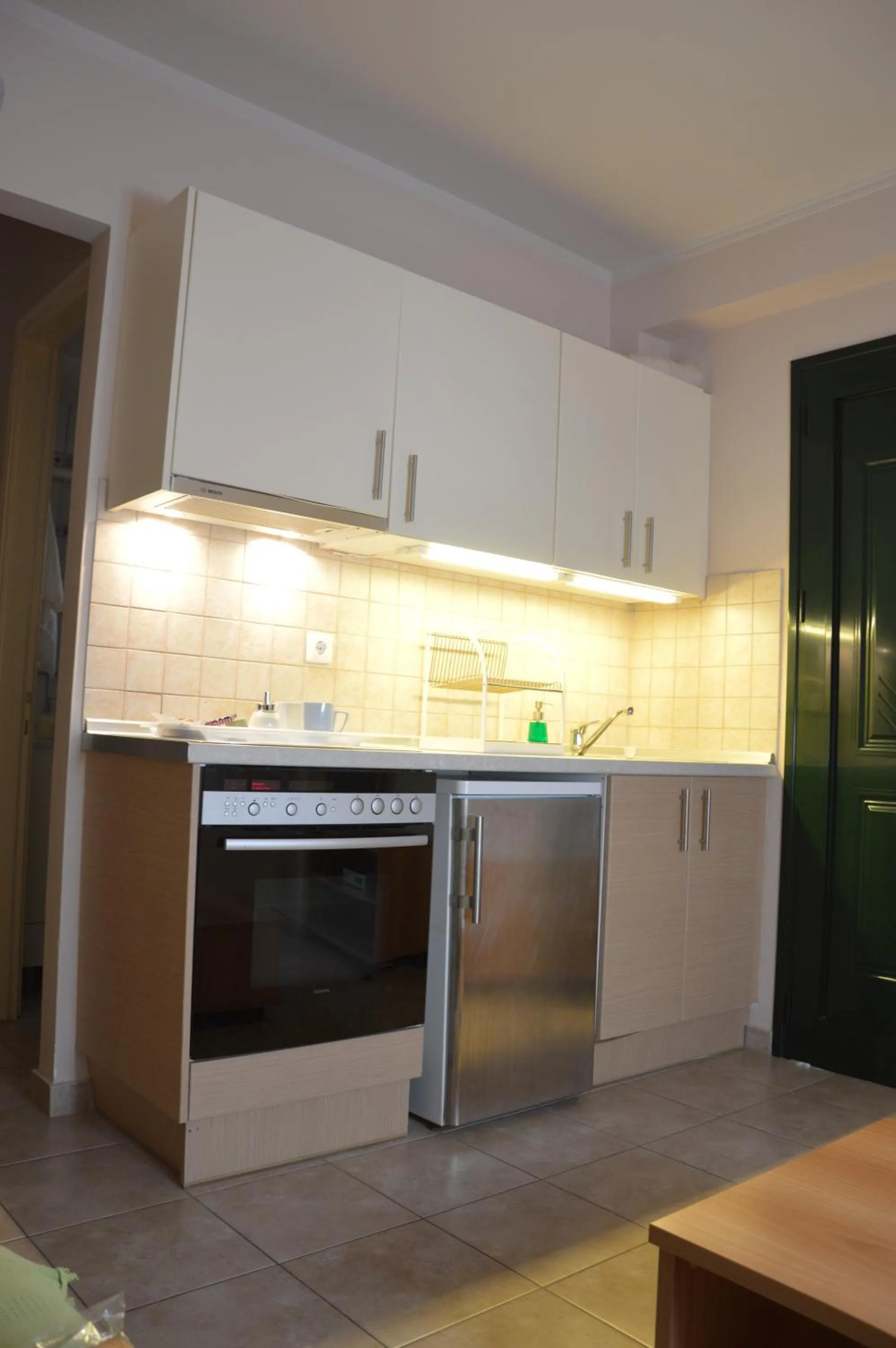 Kitchen or kitchenette in Akis Apartments