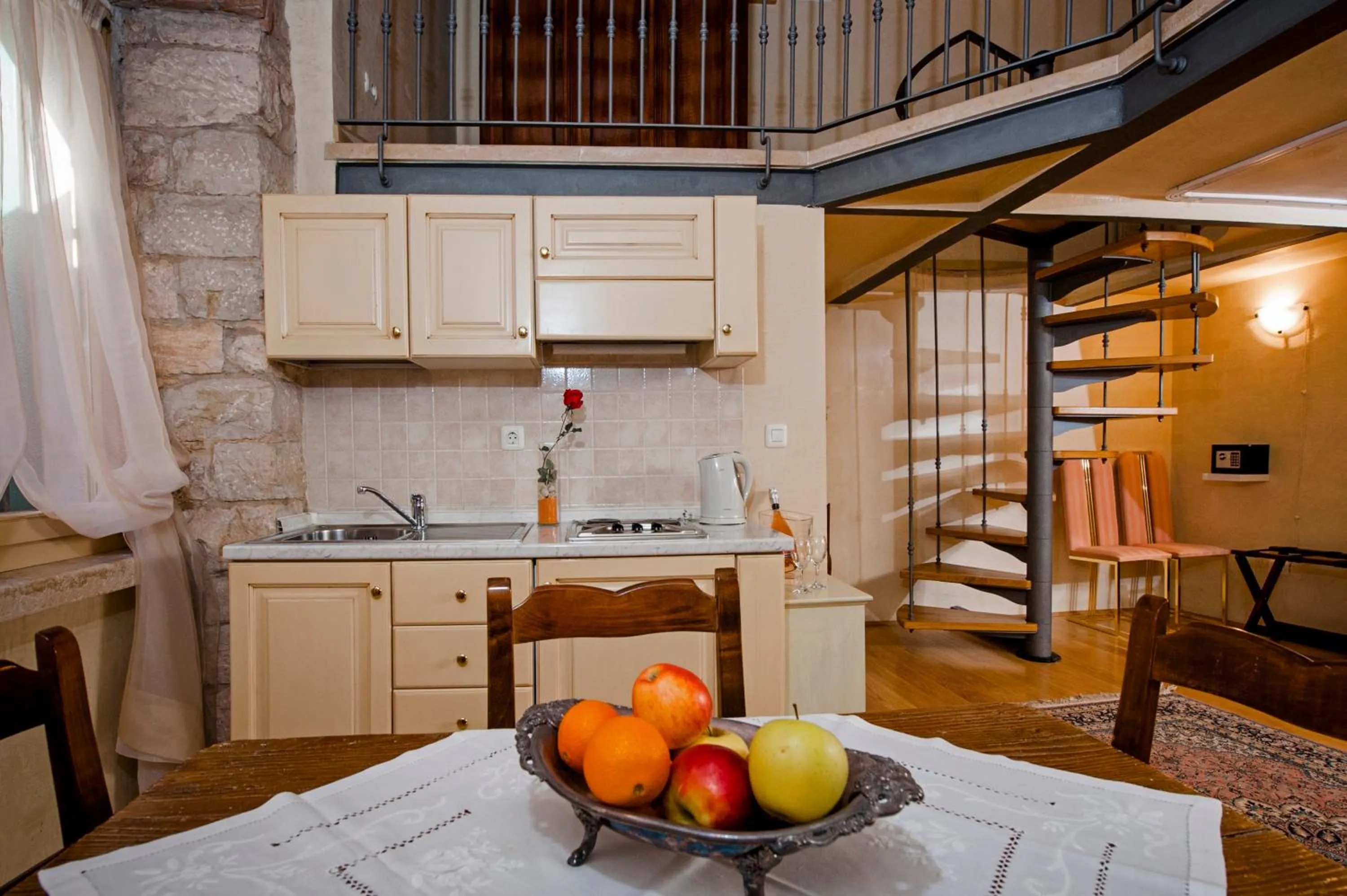 Kitchen or kitchenette in Residence PORTA ANTICA Centro Storico