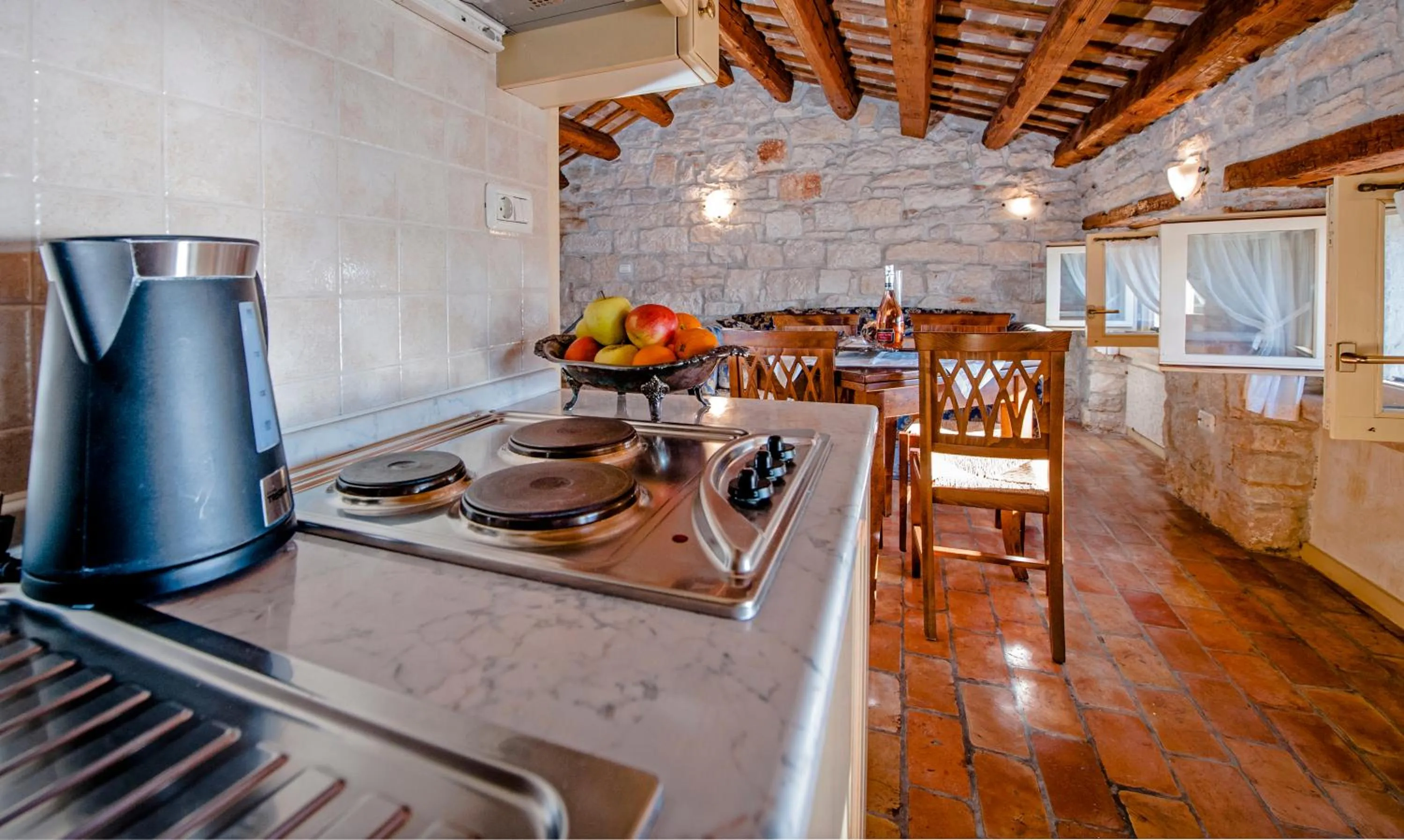 Kitchen or kitchenette in Residence PORTA ANTICA Centro Storico