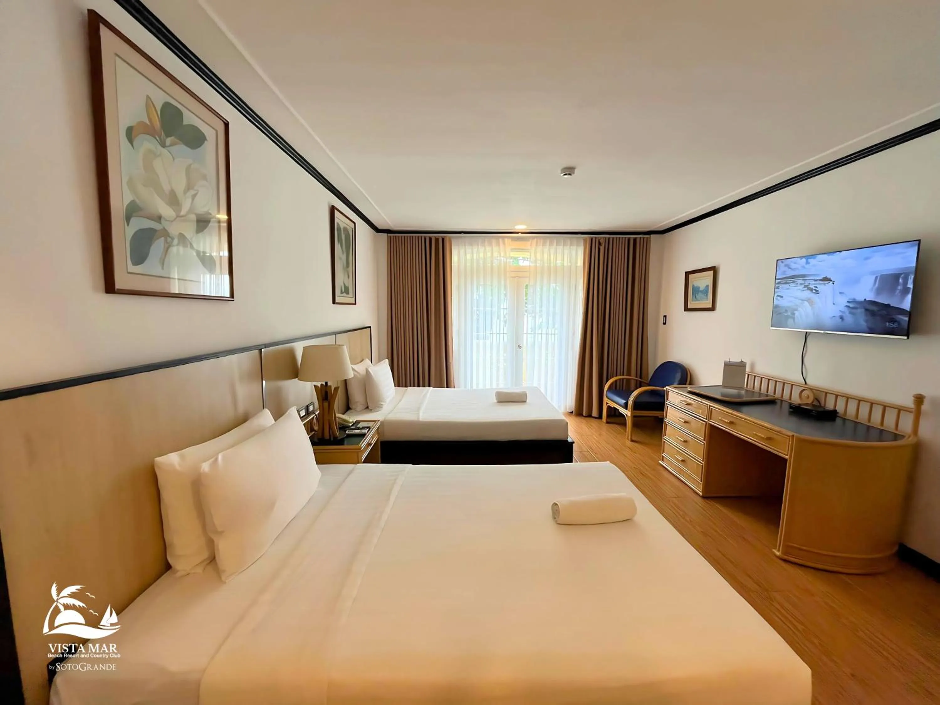 Photo of the whole room, Bed in Vista Mar Beach Resort & Country Club