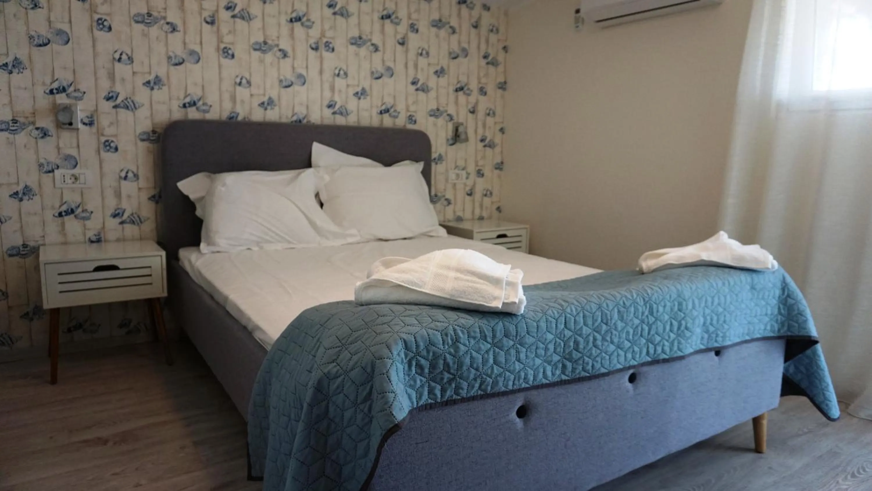 Photo of the whole room, Bed in OITUZ Boutique Residence