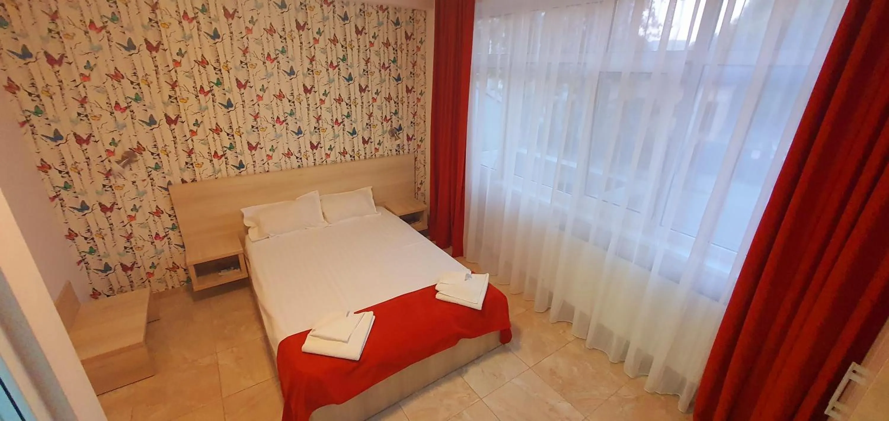 Bed in OITUZ Boutique Residence