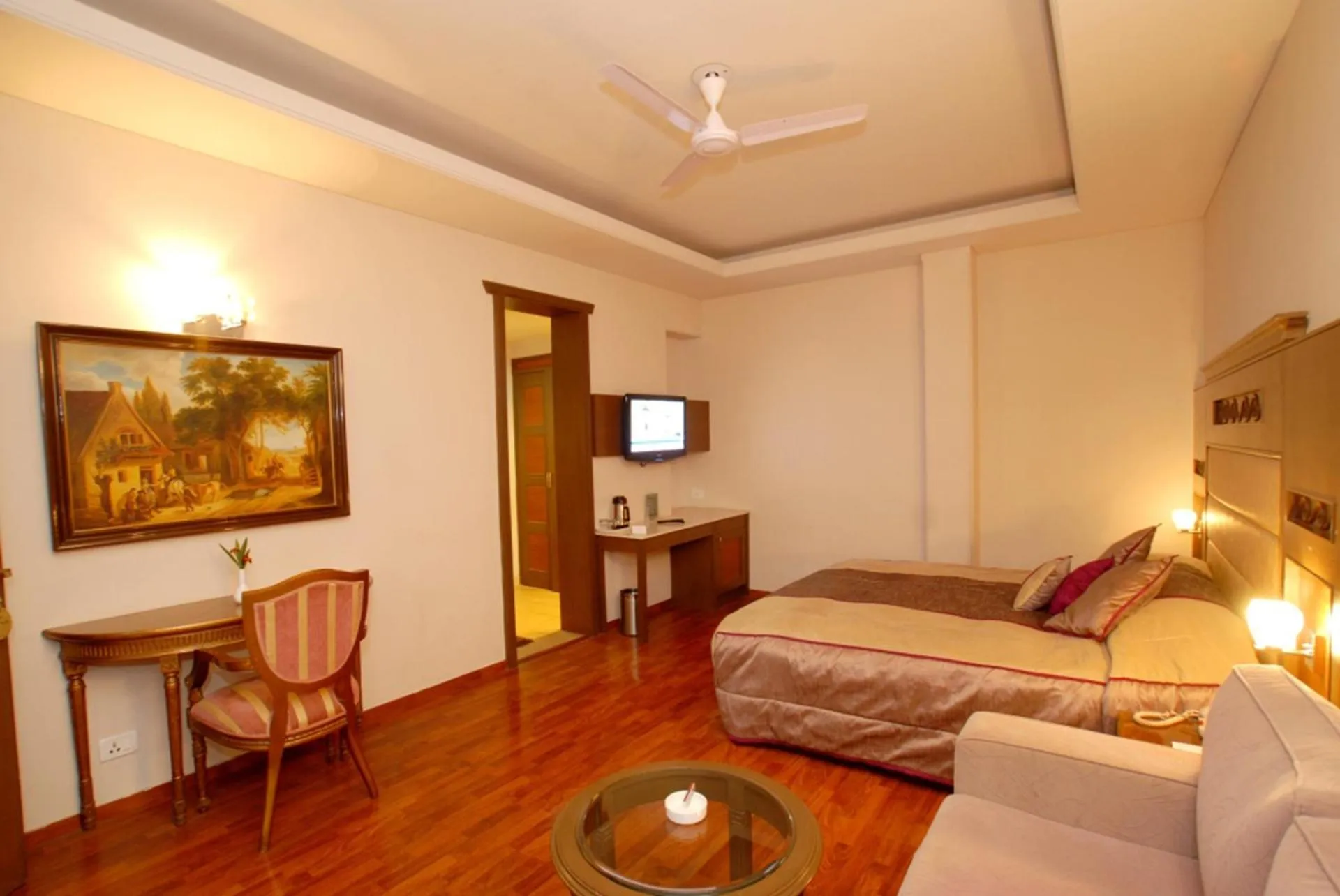 Bed in Vikram Vintage Inn