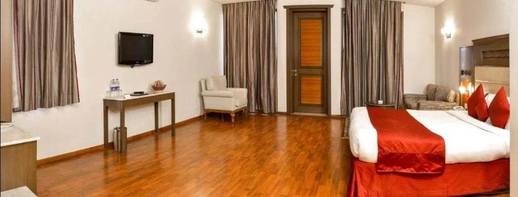 Bed in Vikram Vintage Inn