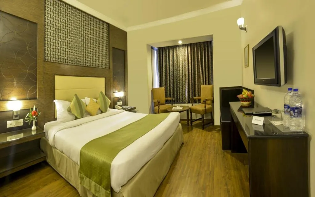 Bed in Vikram Vintage Inn