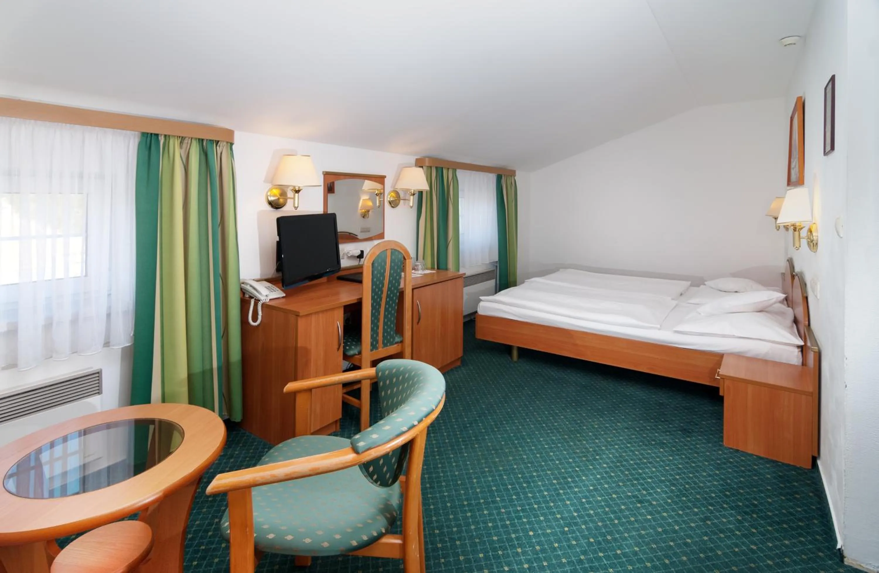 Bed in Hotel Spindlerova Bouda