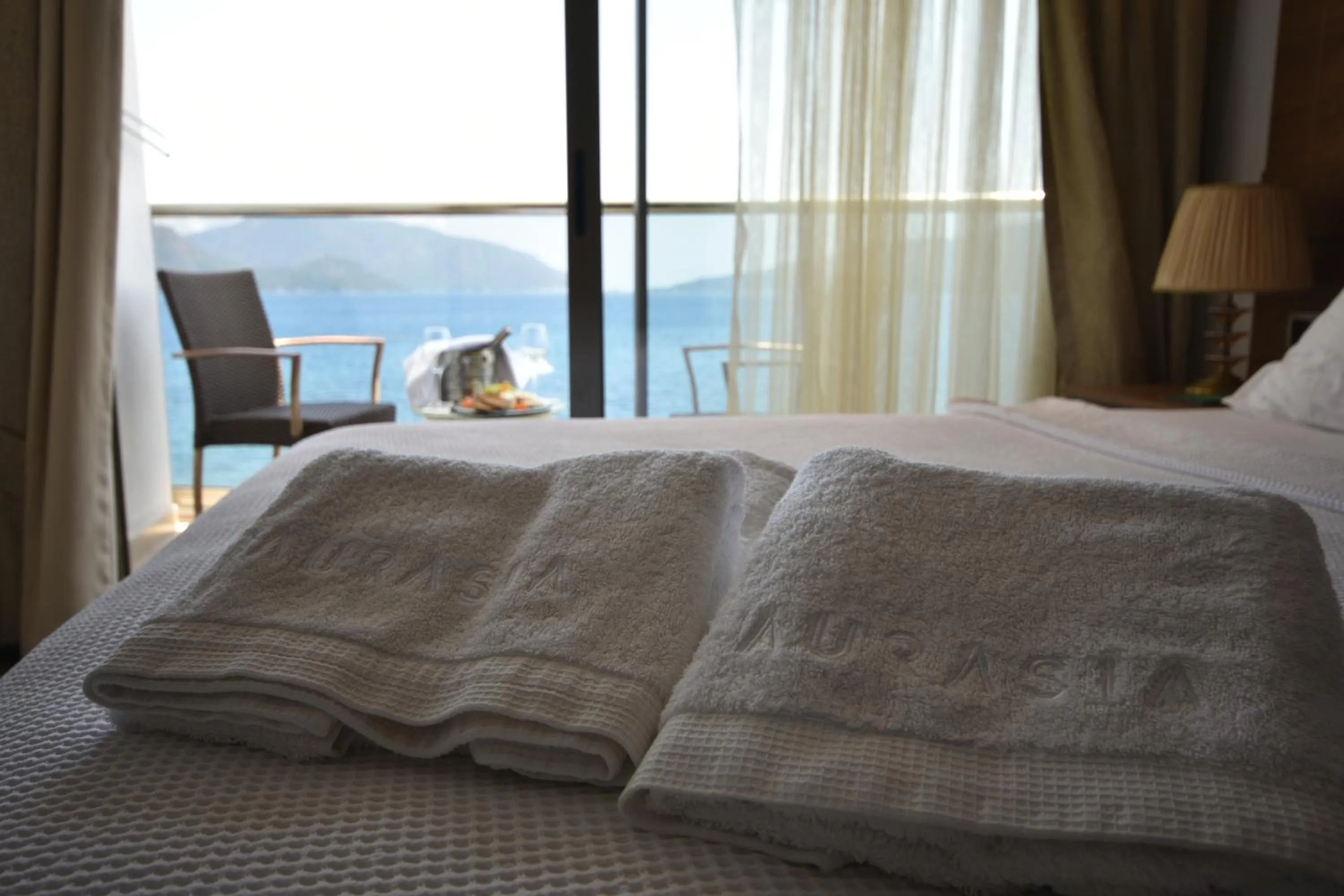 Bed in Aurasia Beach Hotel