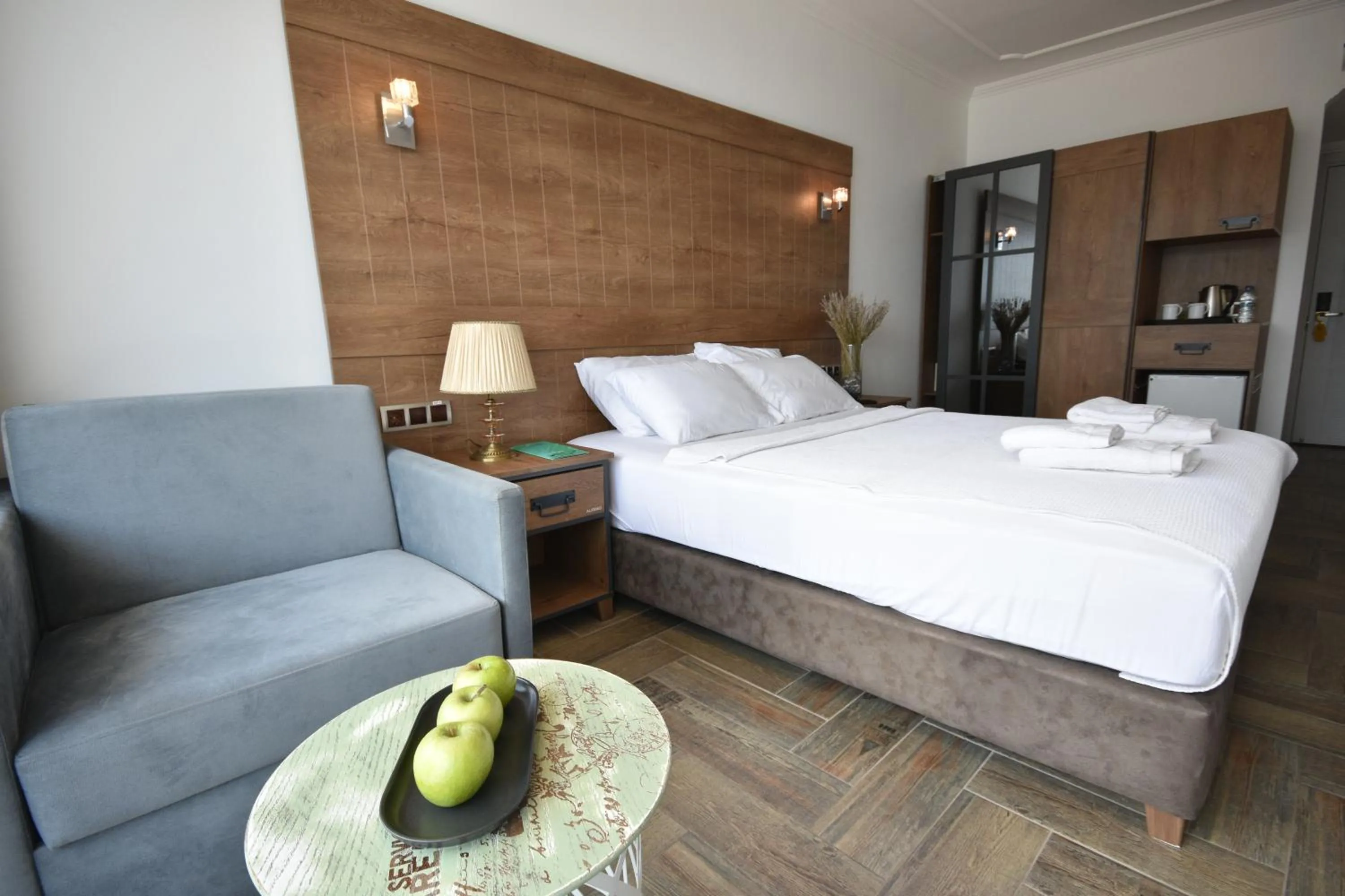 Bed in Aurasia Beach Hotel