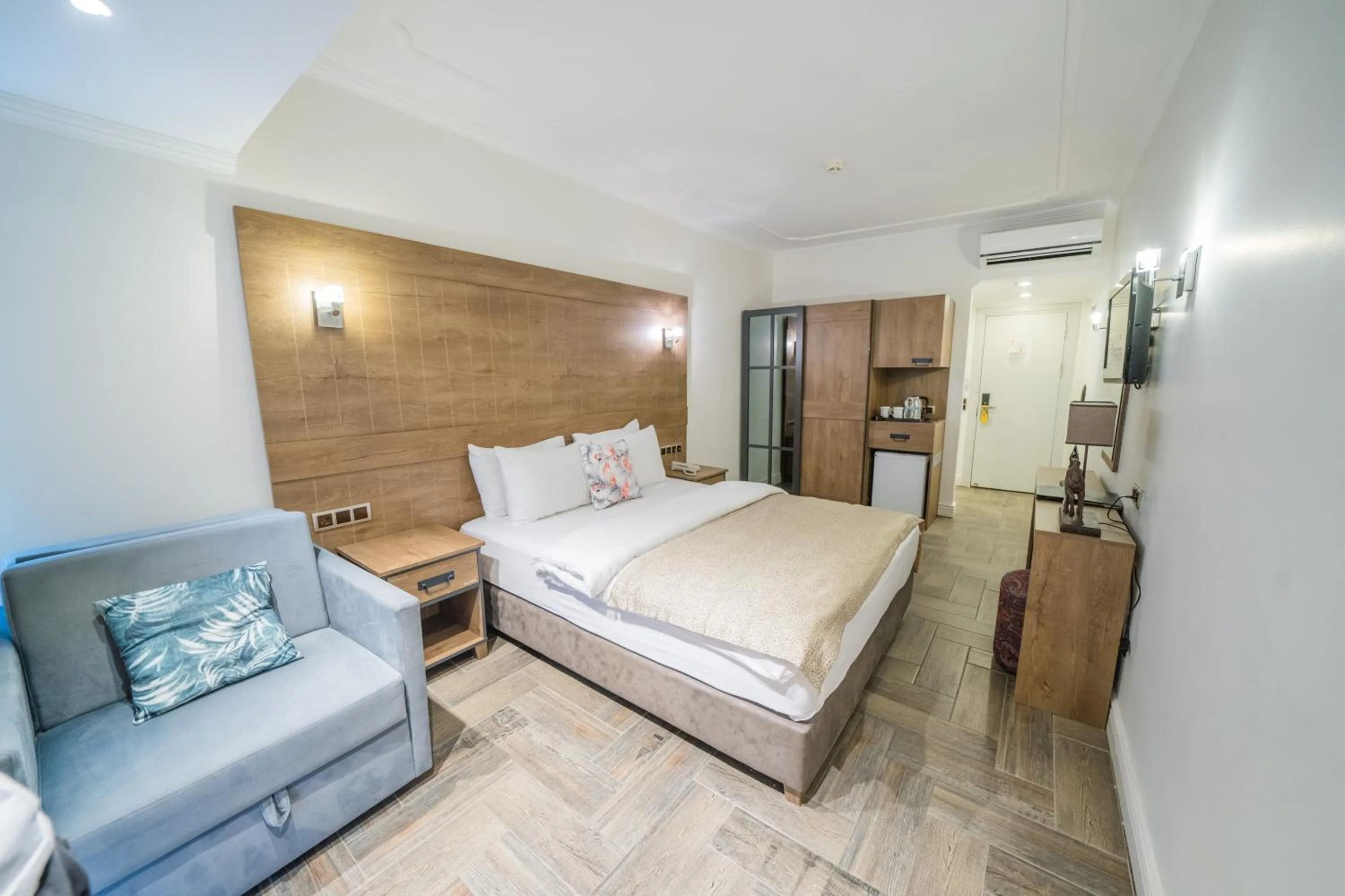 Bed in Aurasia Beach Hotel