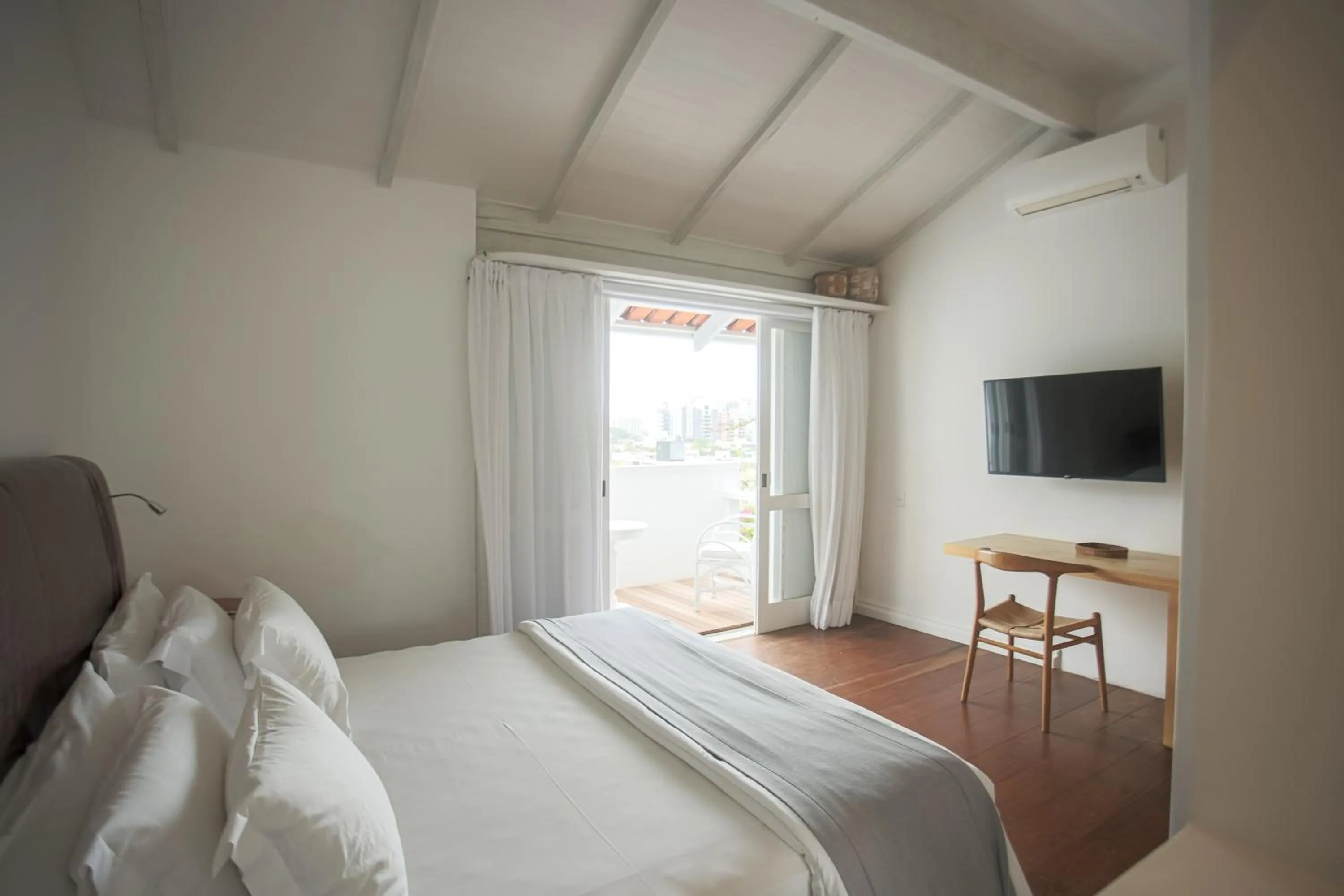 Bed in Felissimo Exclusive Hotel