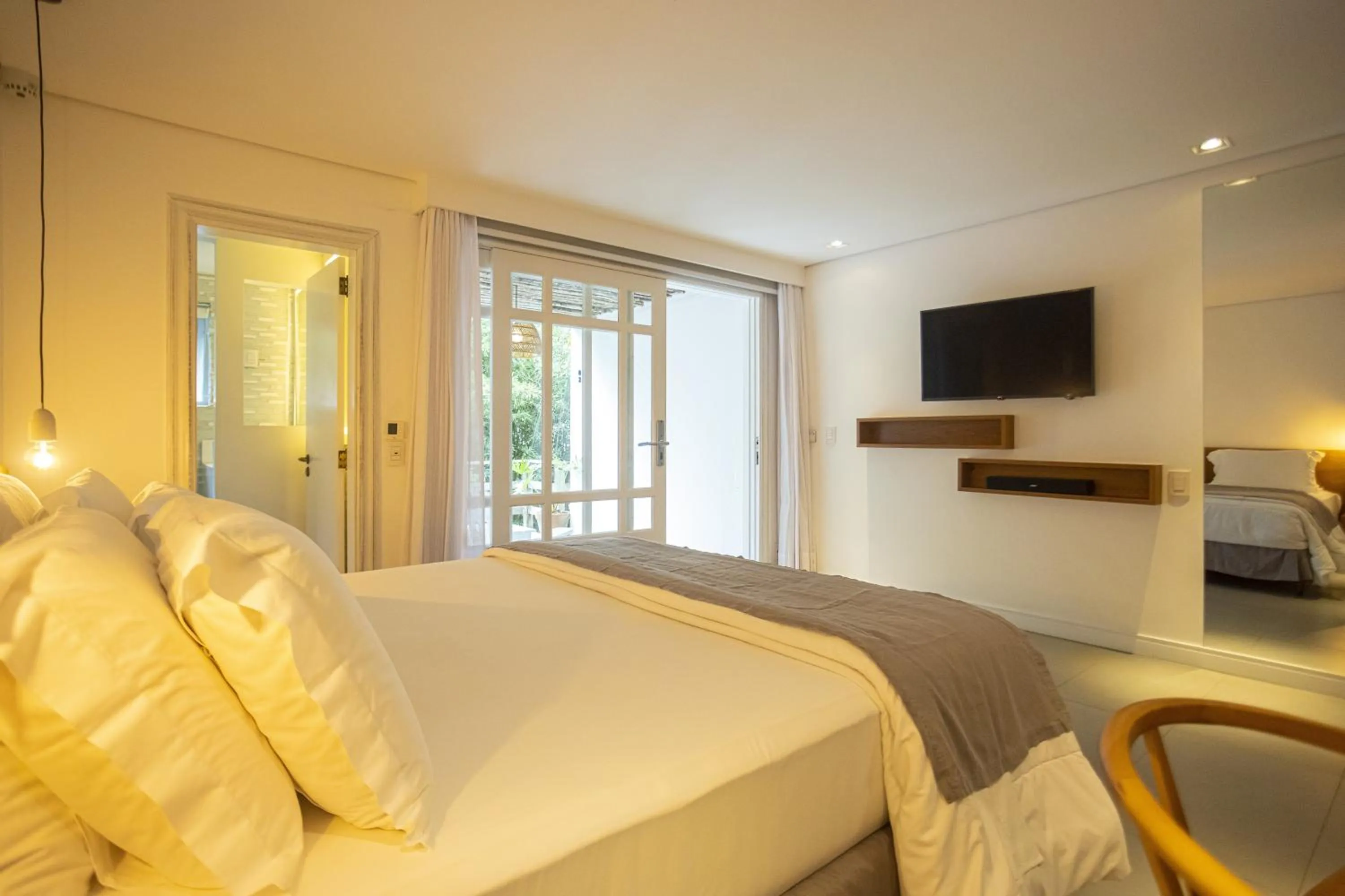 Bed in Felissimo Exclusive Hotel