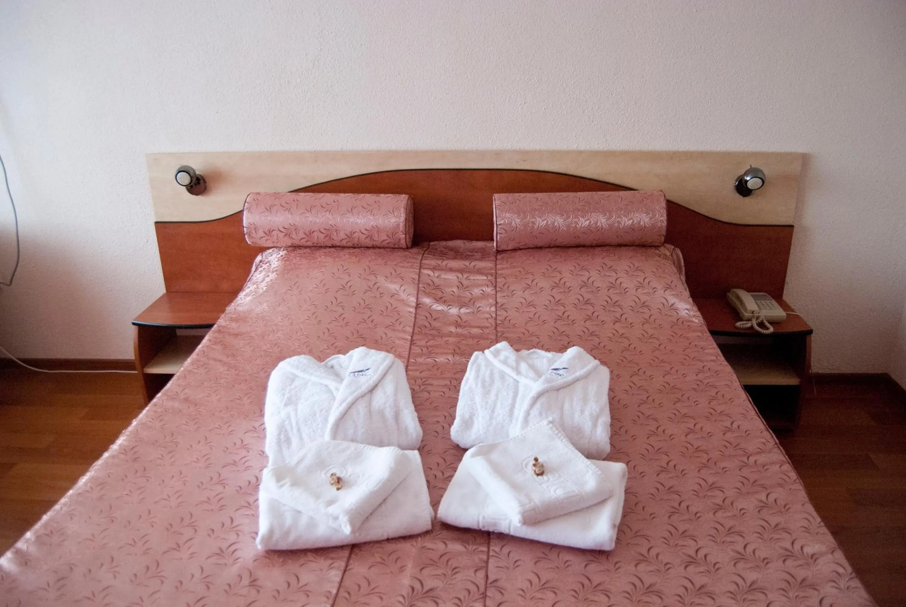 Bed in Hotel Paradiso