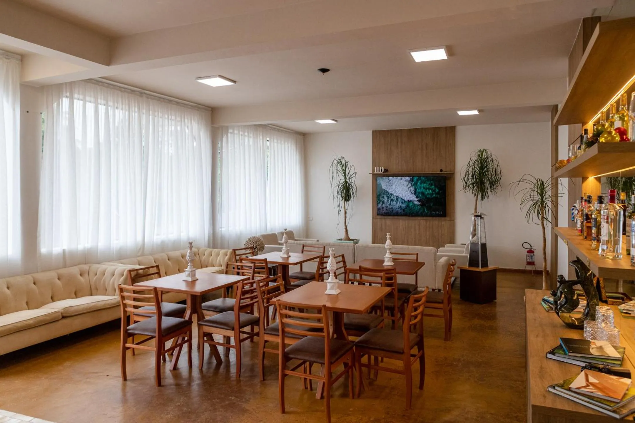 Communal lounge/ TV room in Pousada de Charme Vila Natal