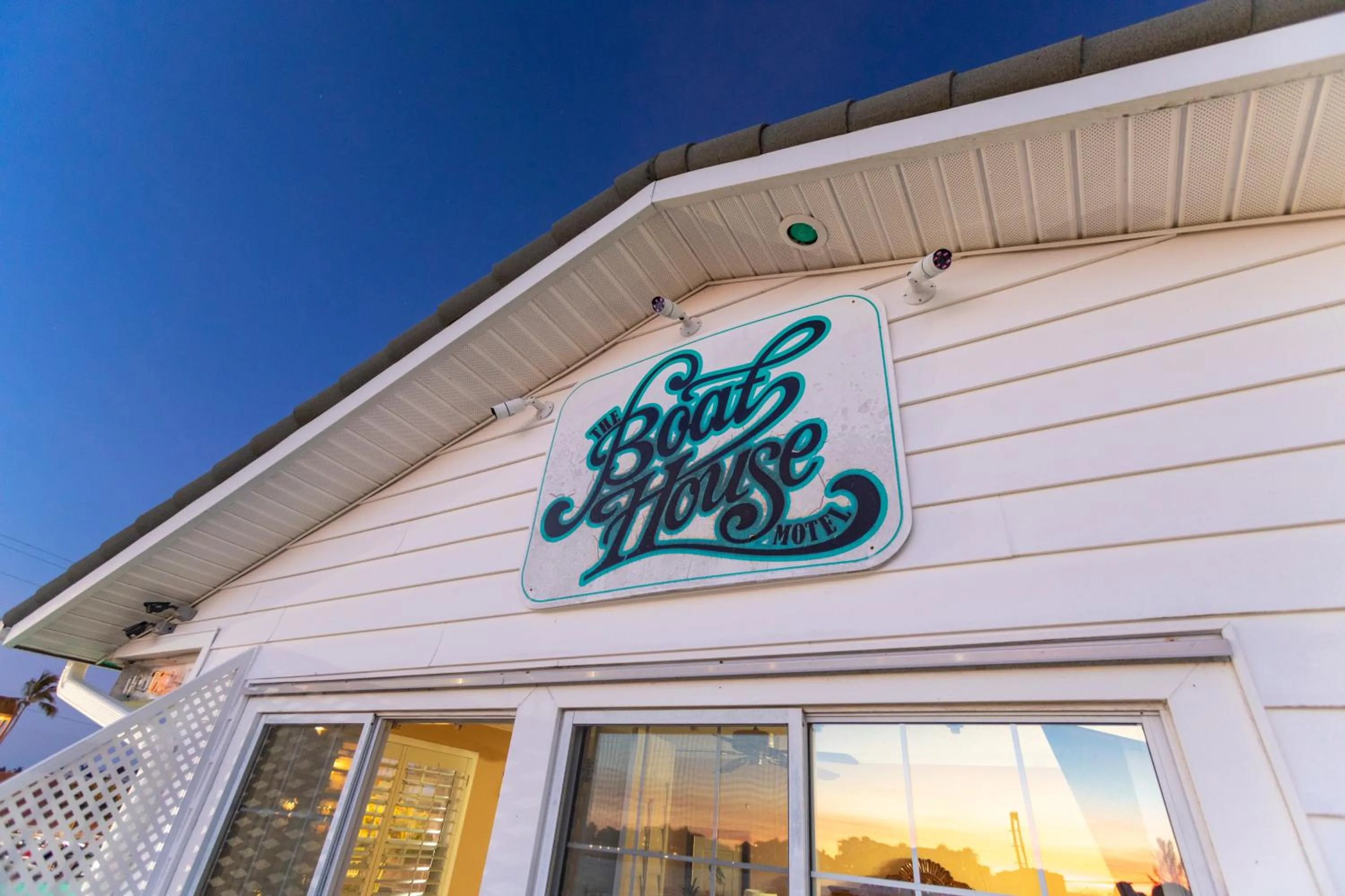 Property logo or sign in The BoatHouse