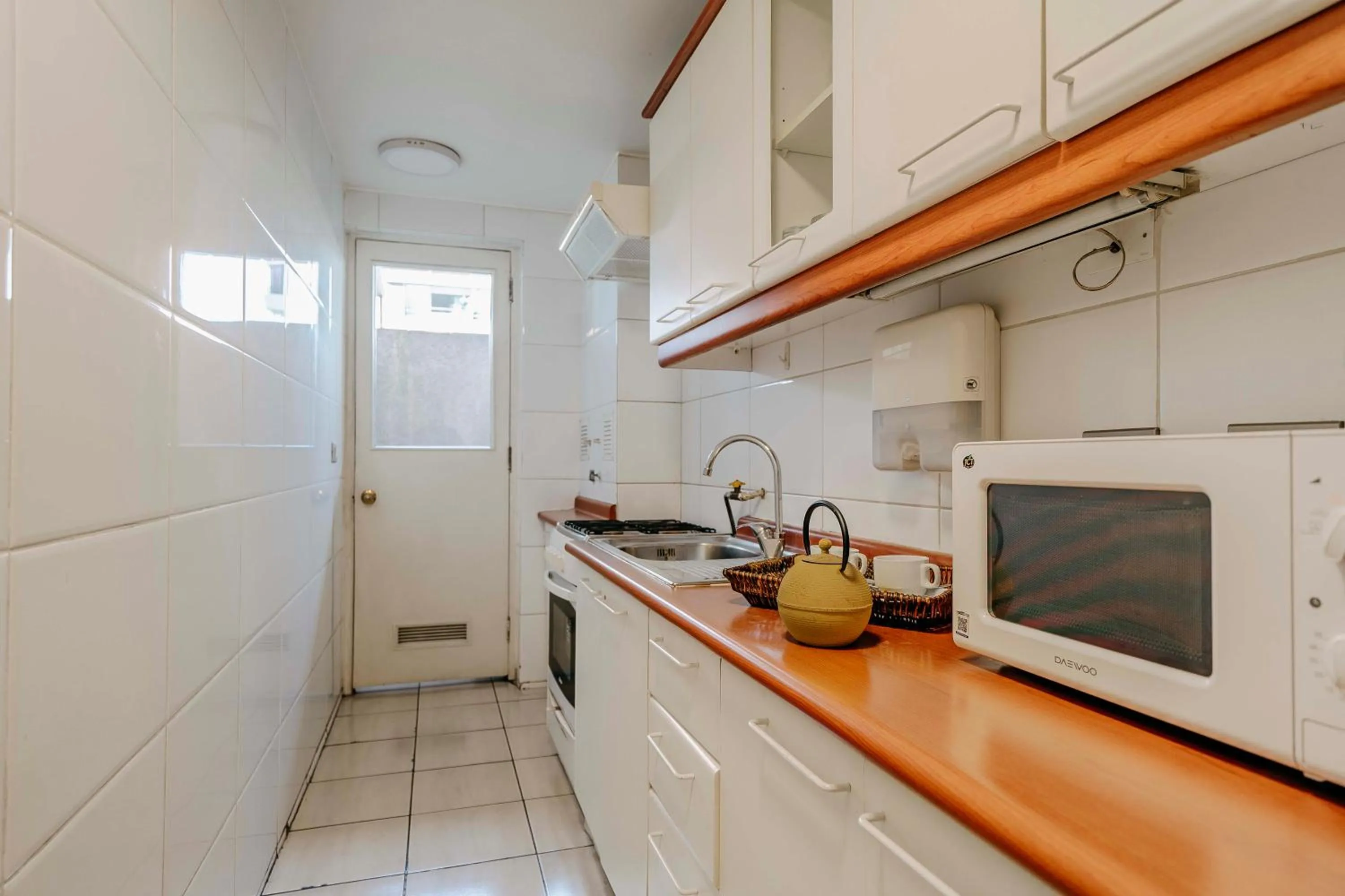 Kitchen or kitchenette in Time Suite - Comfort Apartments