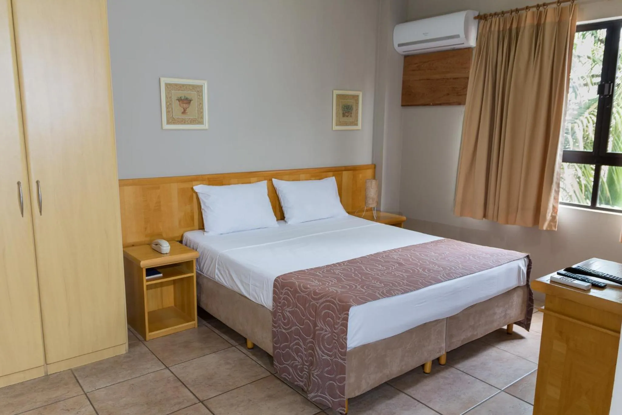 Bed in Maria Quitéria Hotel & Flat