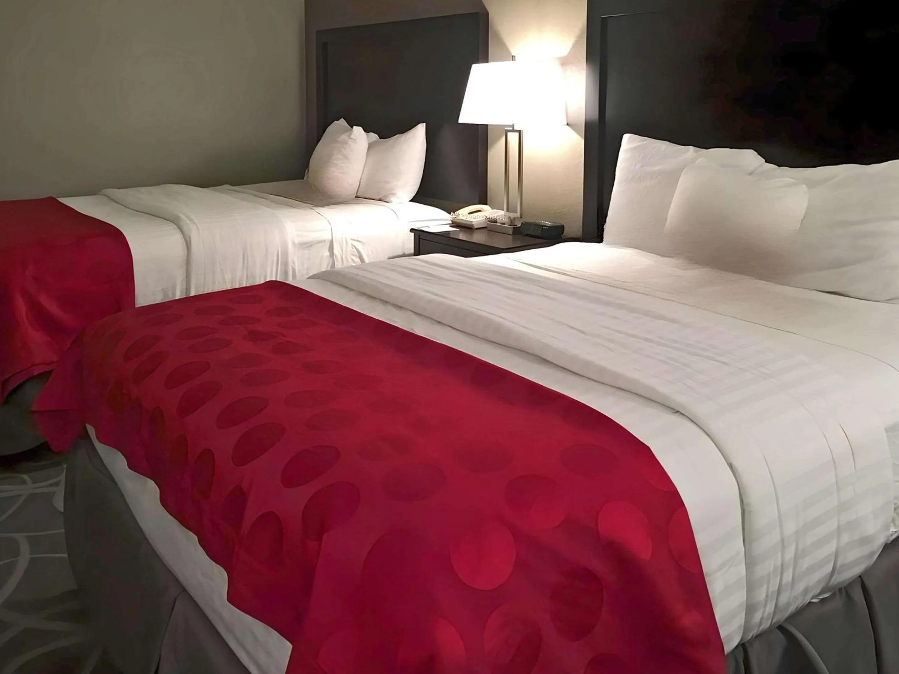 Bedroom, Bed in Ramada by Wyndham Des Moines Airport