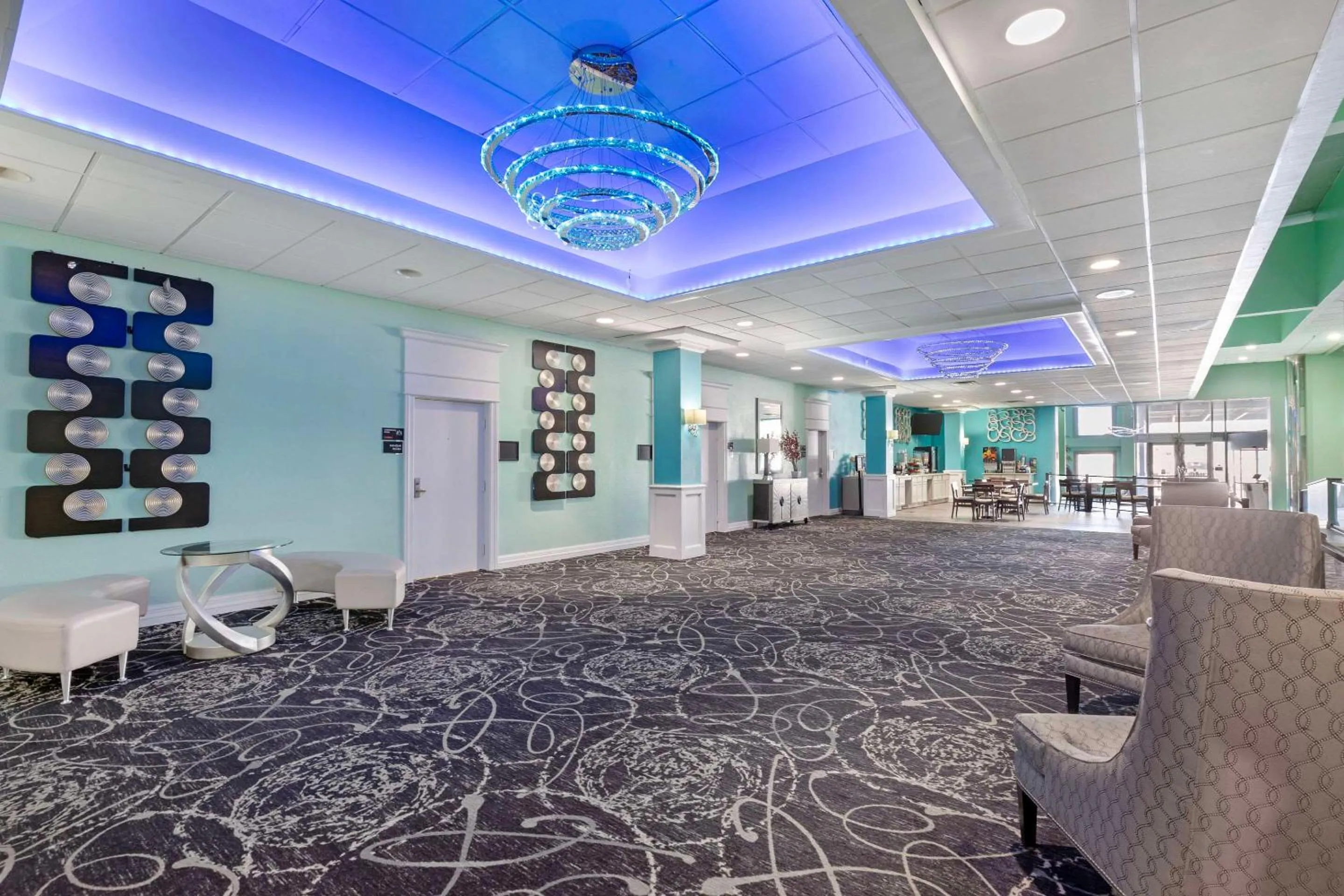 Lobby or reception in Ramada by Wyndham Des Moines Airport