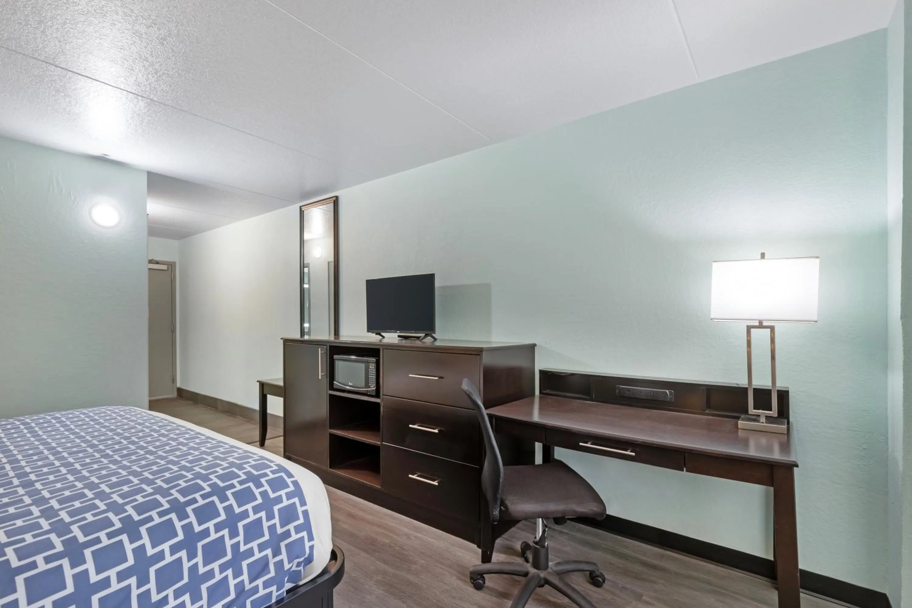 Bed in Ramada by Wyndham Des Moines Airport