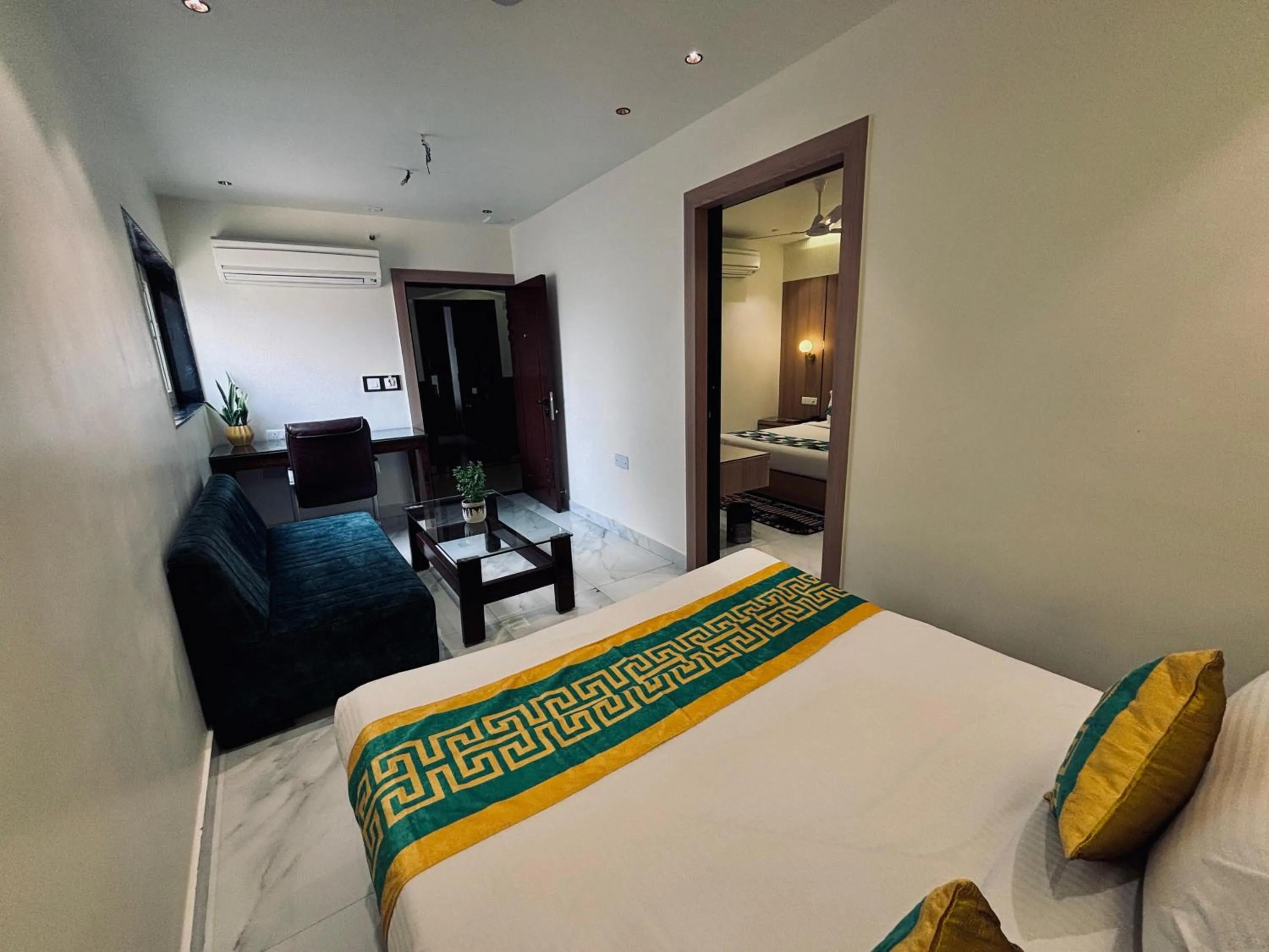 Bed in Taj Inn Hotel