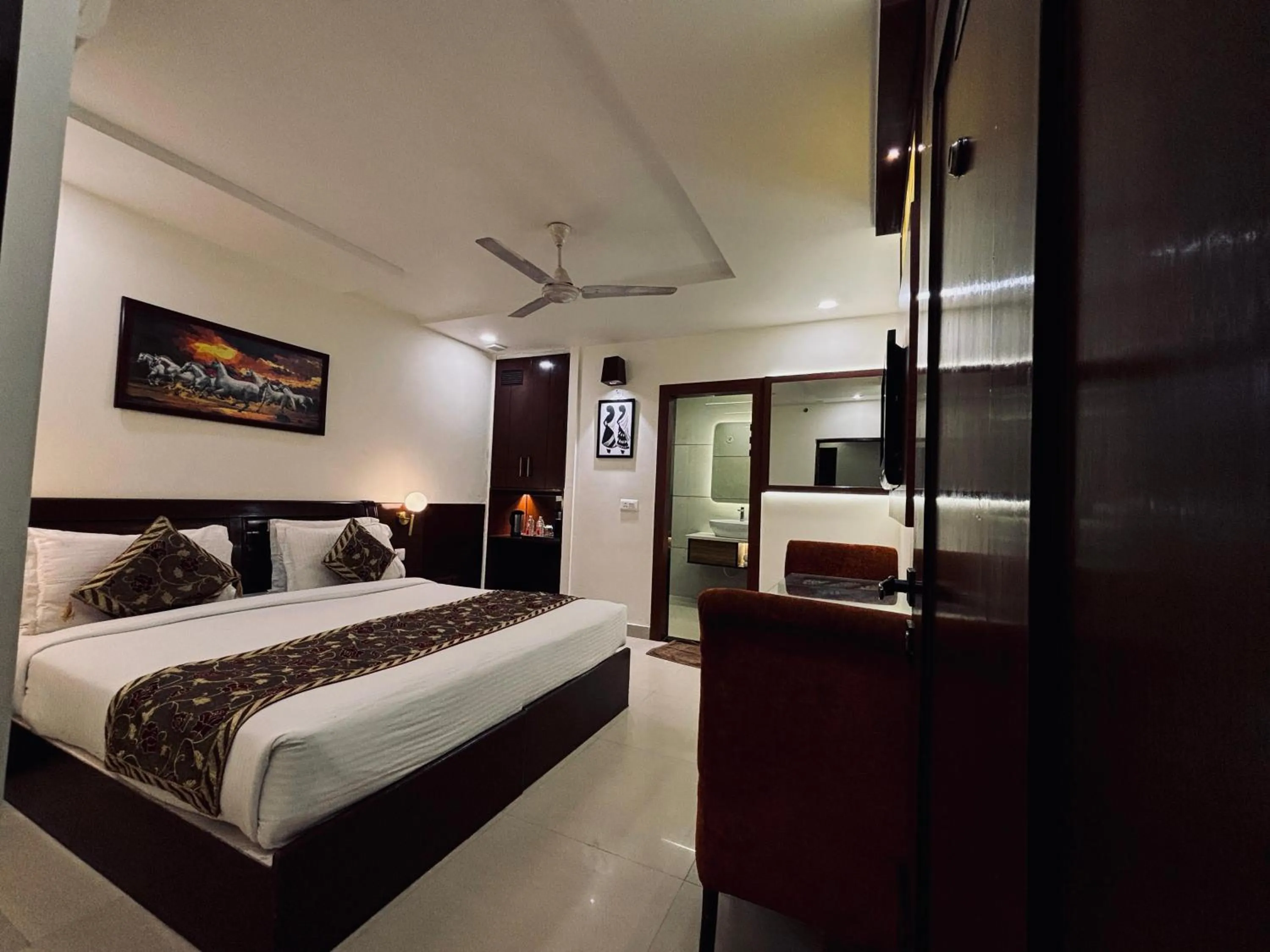 Bed in Taj Inn Hotel