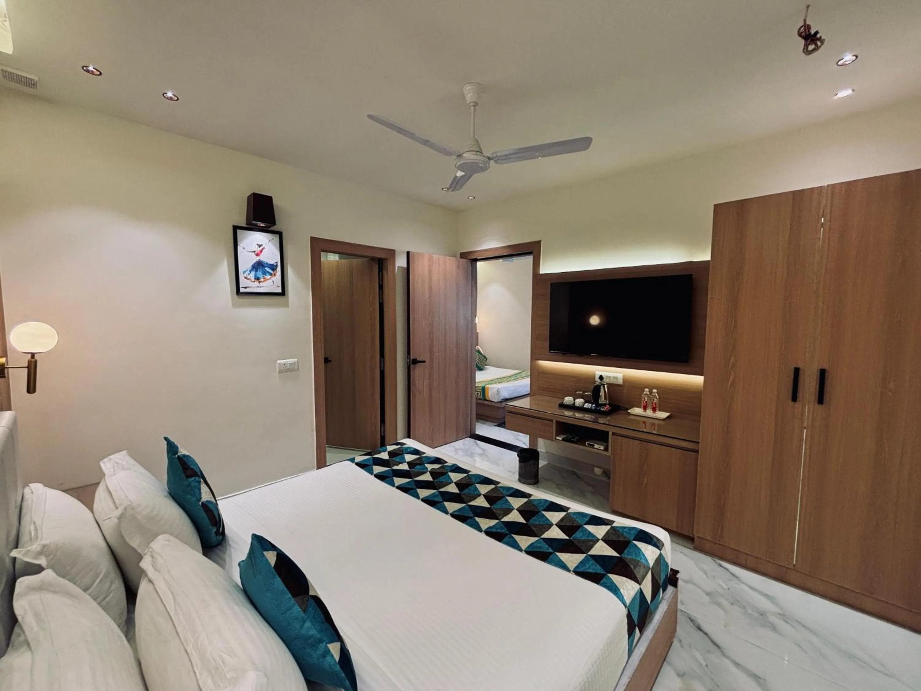 Bed in Taj Inn Hotel