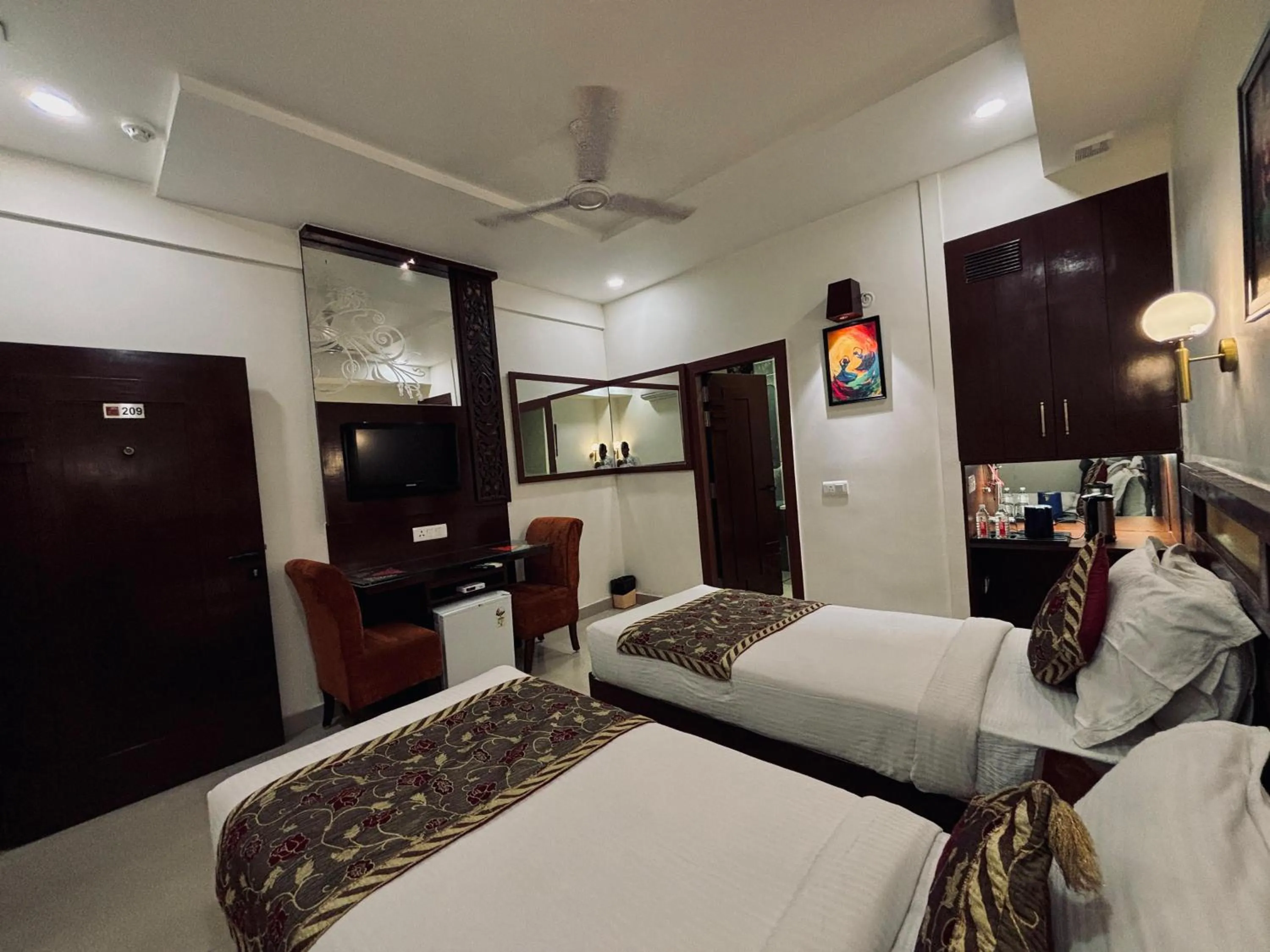 Bed in Taj Inn Hotel