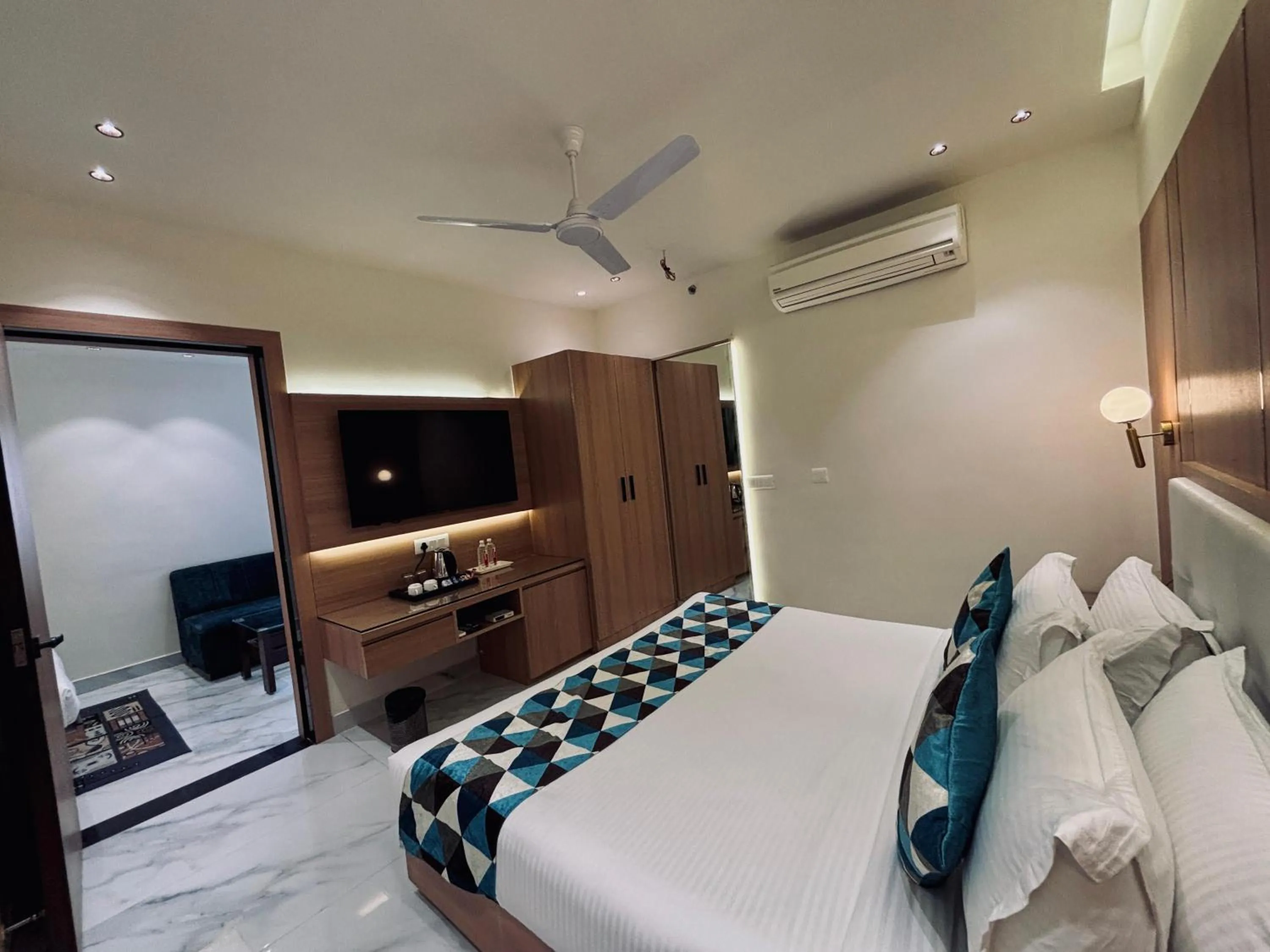 Bed in Taj Inn Hotel