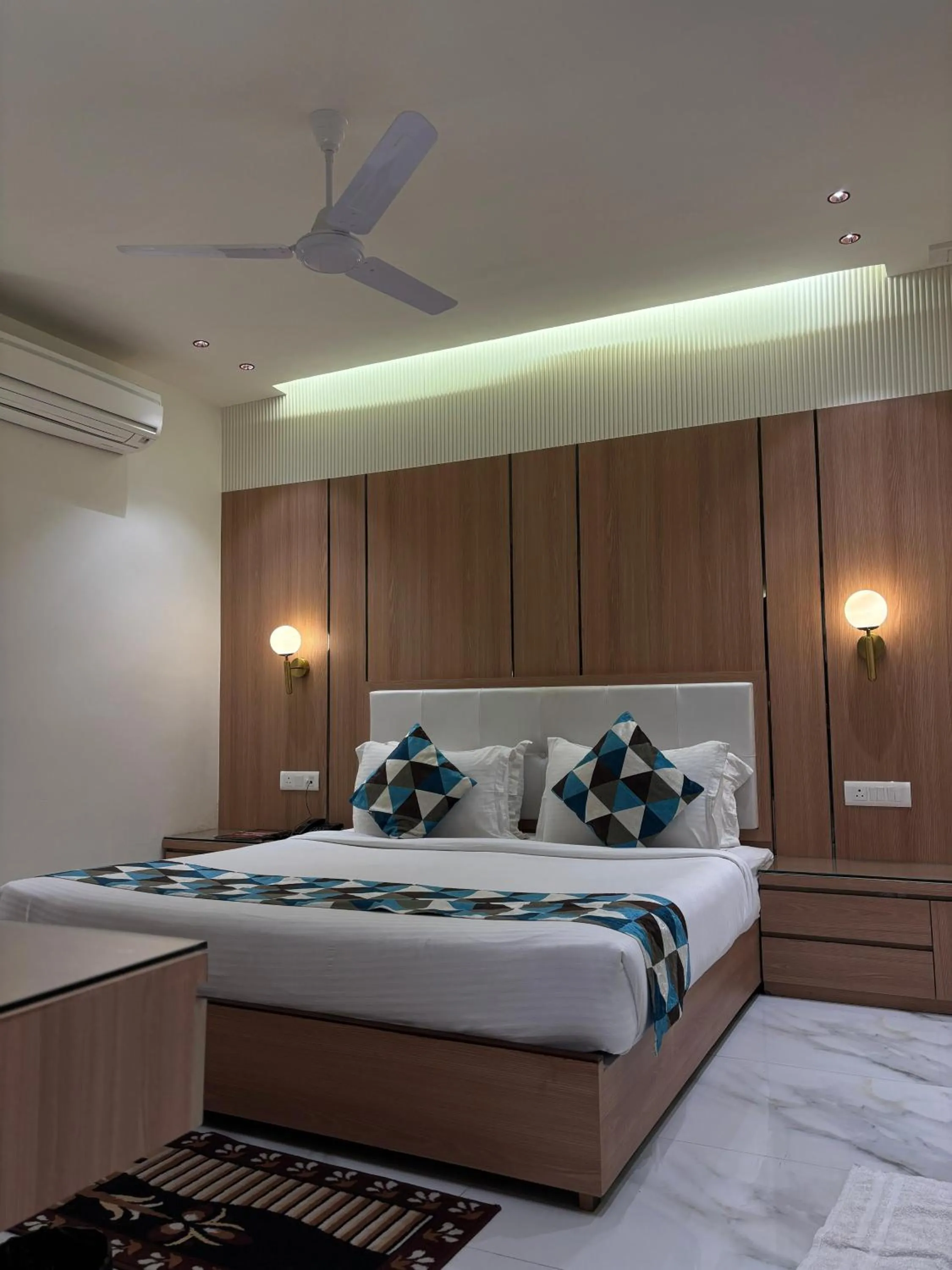 Bed in Taj Inn Hotel