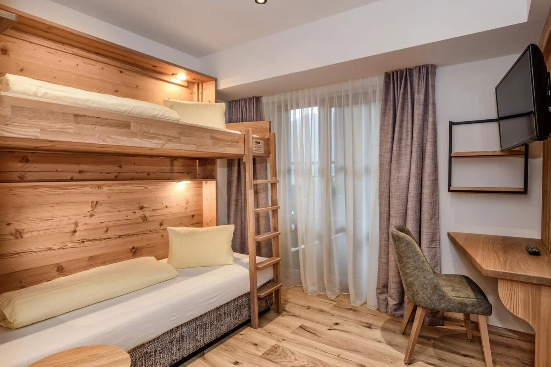 Bed in Berghotel Hauserbauer