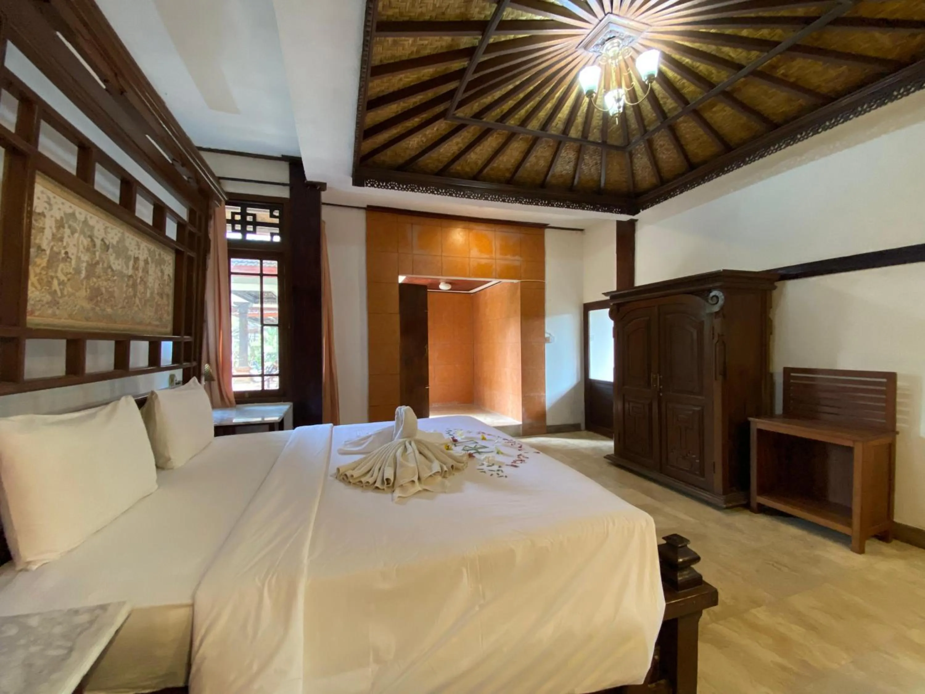 Bed in Suly Vegetarian Resort & Spa