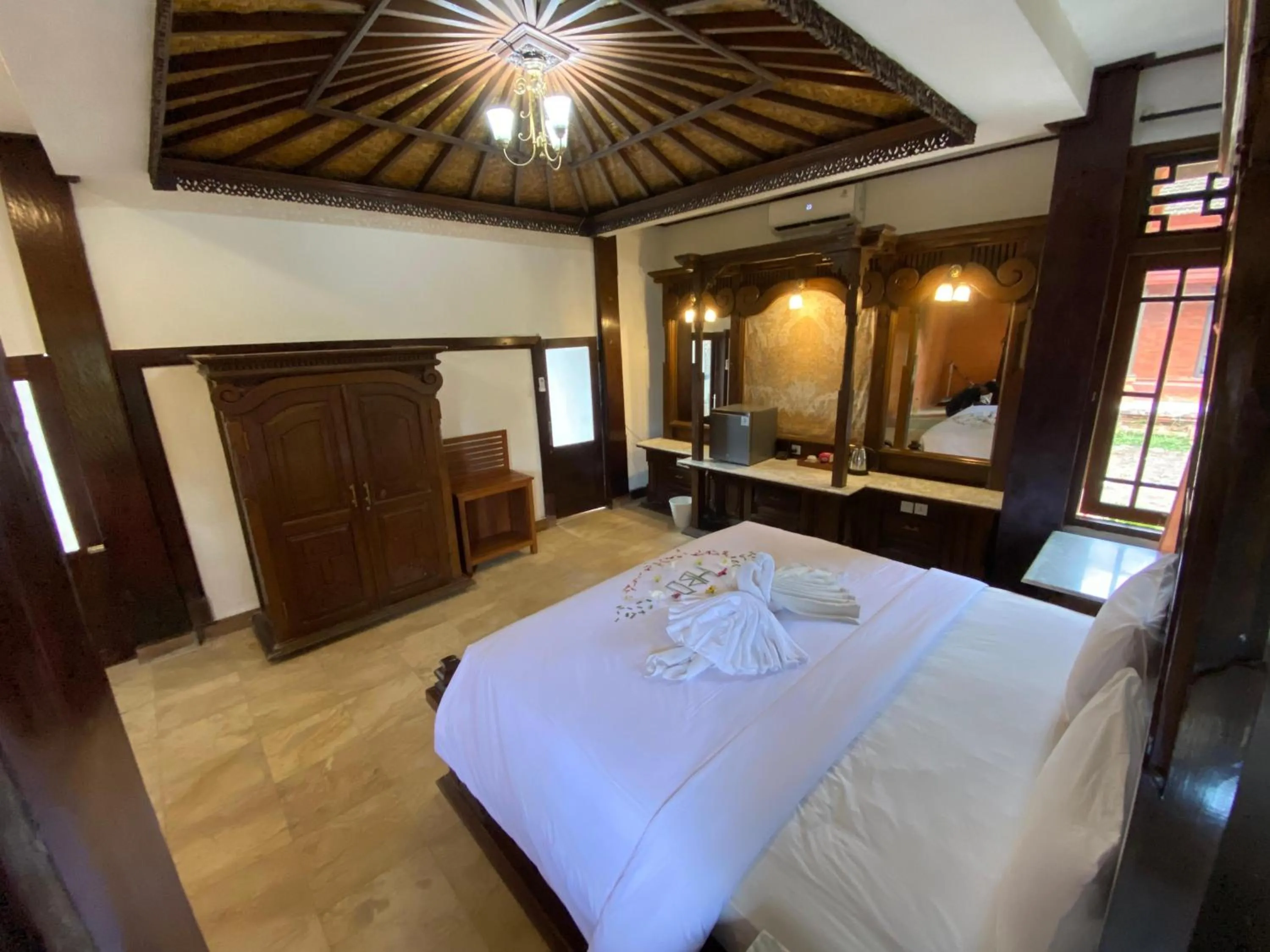 Bed in Suly Vegetarian Resort & Spa