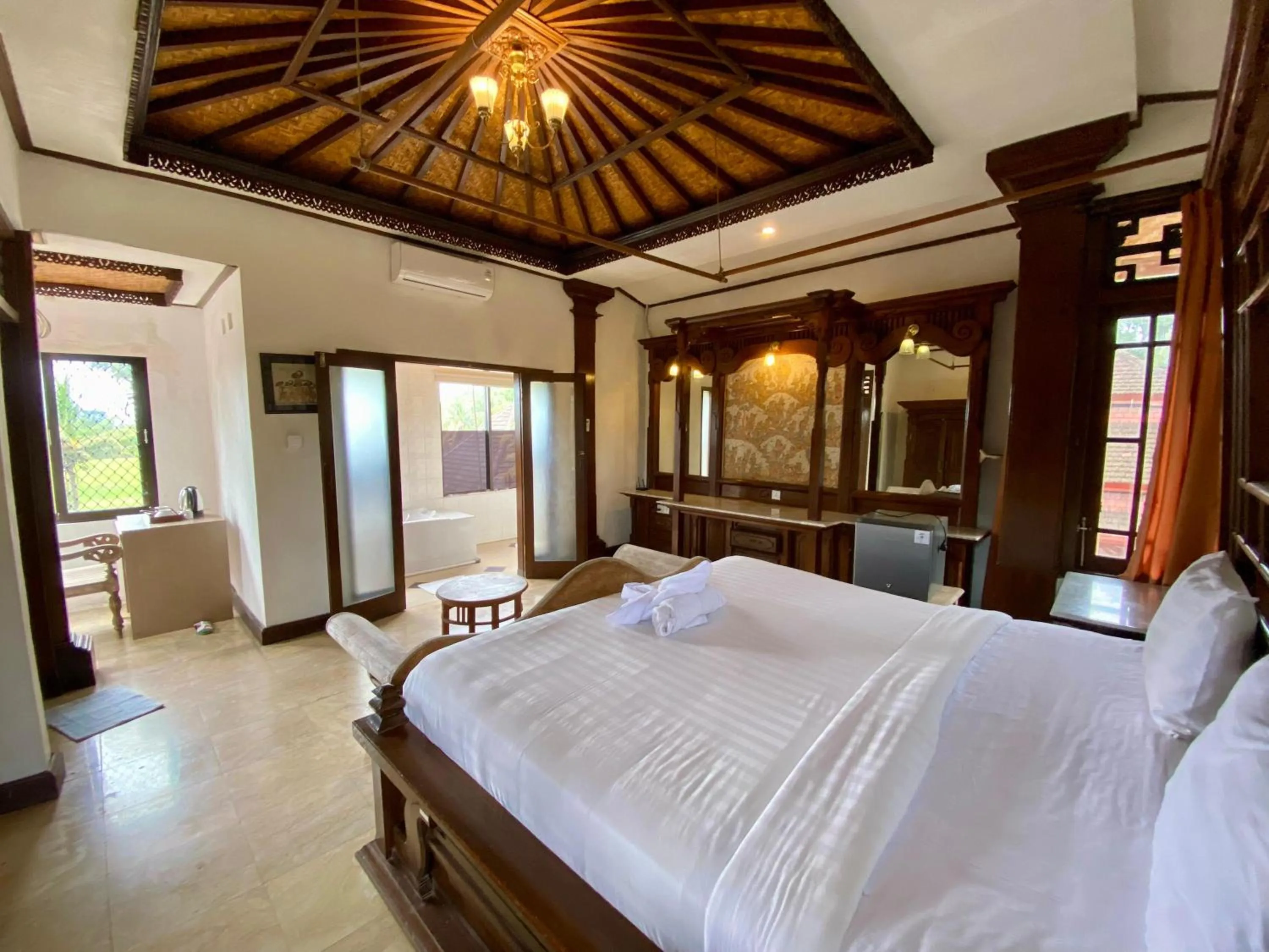 Bed in Suly Vegetarian Resort & Spa