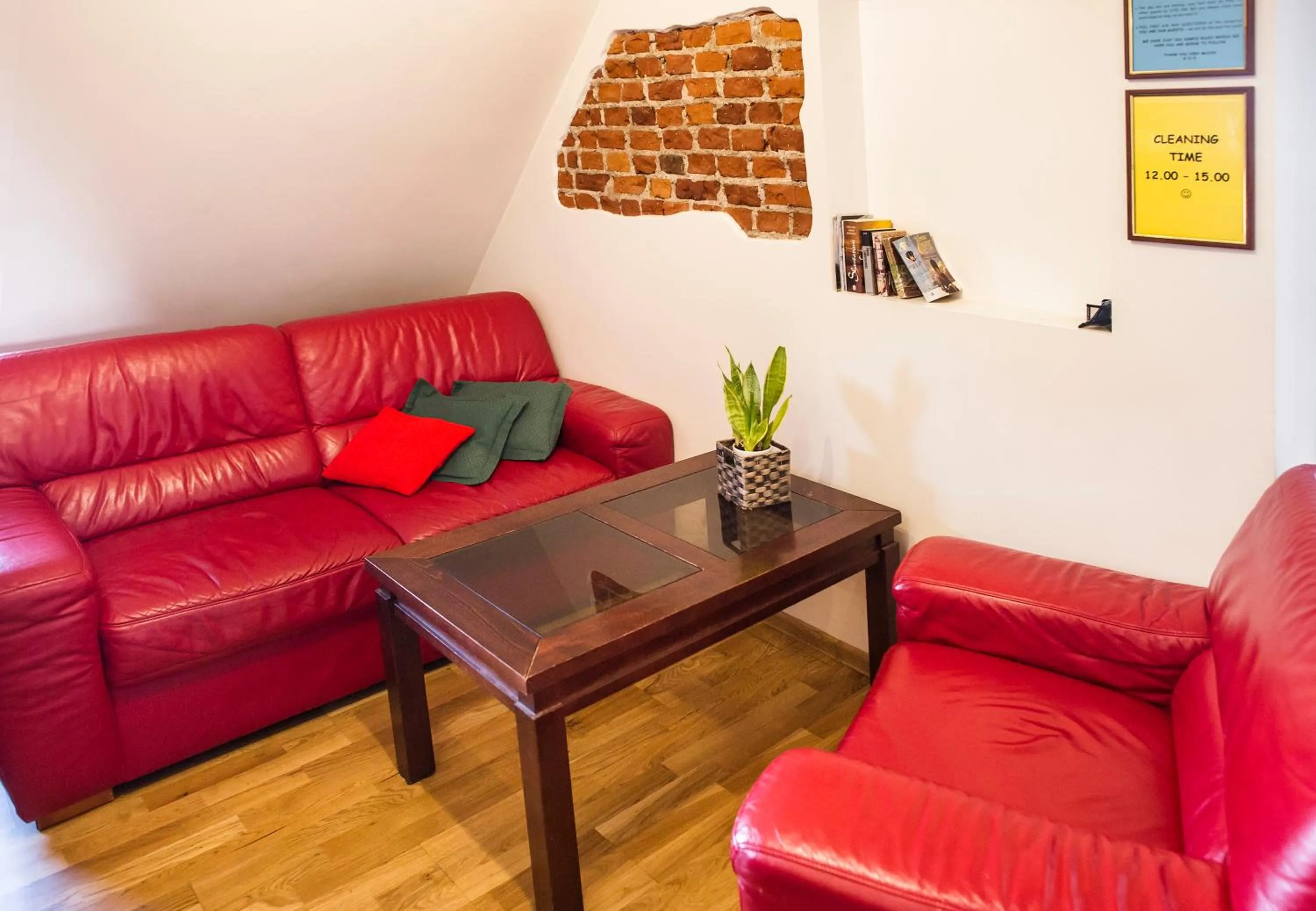 Communal lounge/ TV room in Klaipeda Hostel