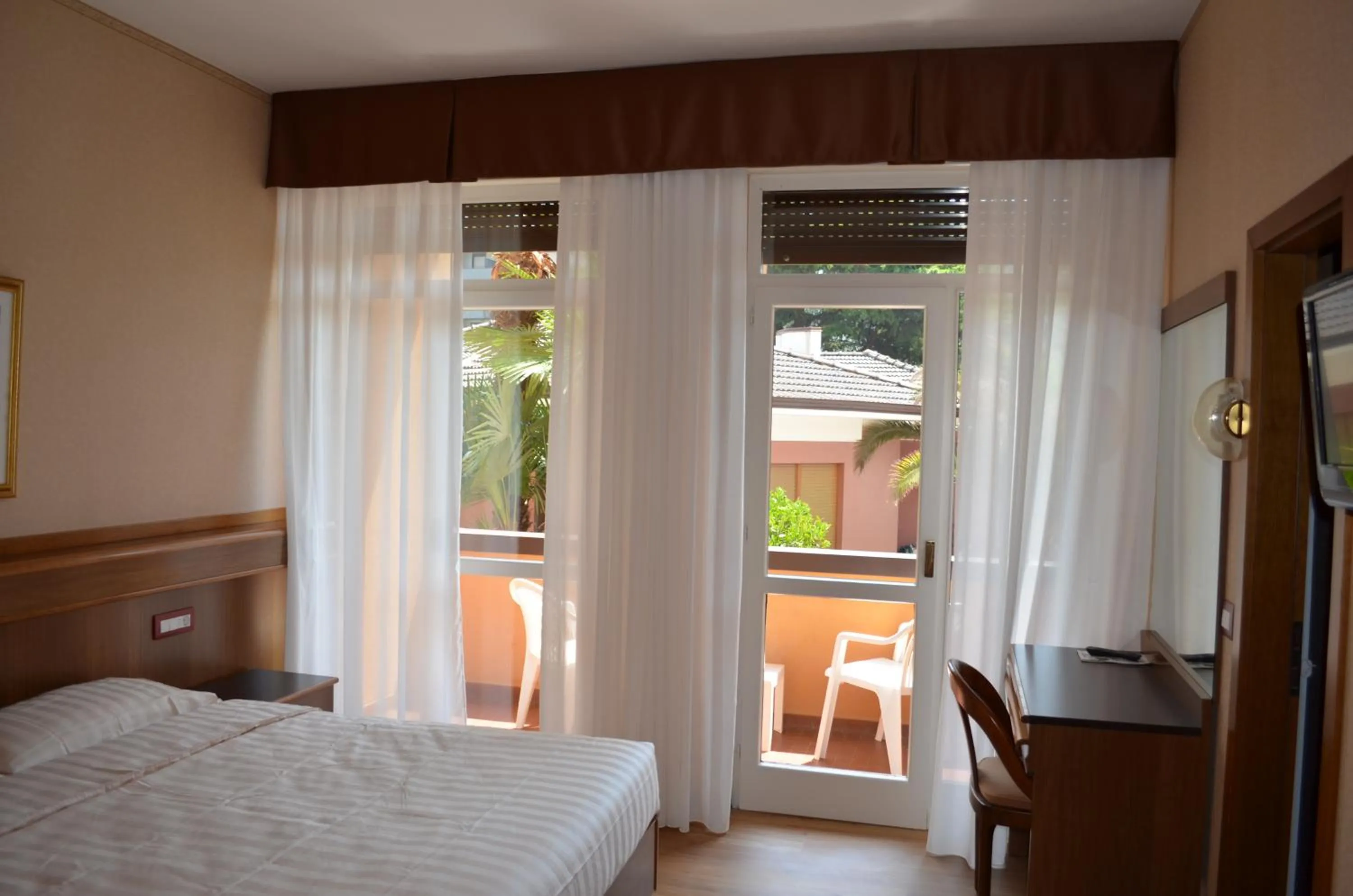 Bed in SunLake Hotel