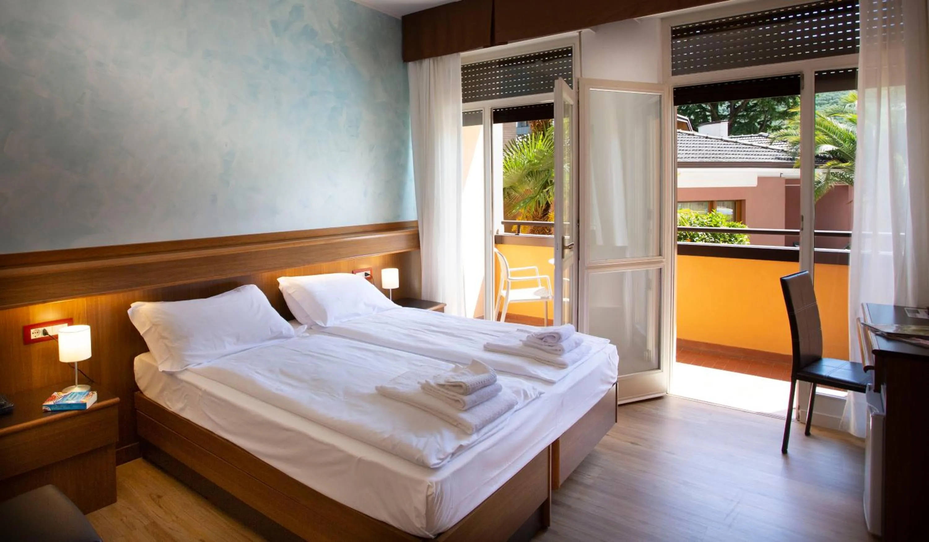 Bed in SunLake Hotel