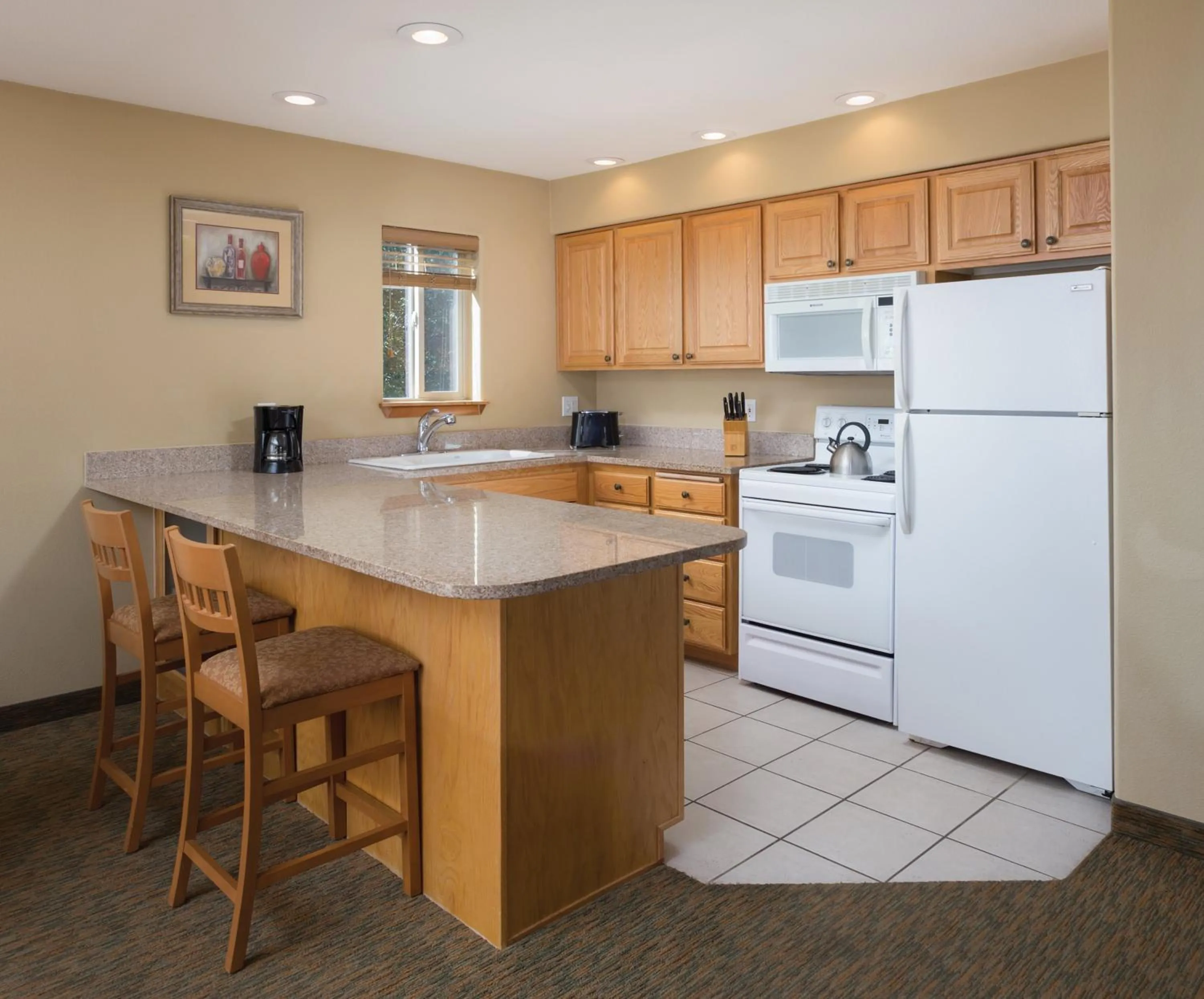 Kitchen or kitchenette in Whispering Woods Resort