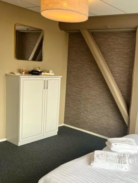 Bed in Bed and Breakfast De Zeehoeve