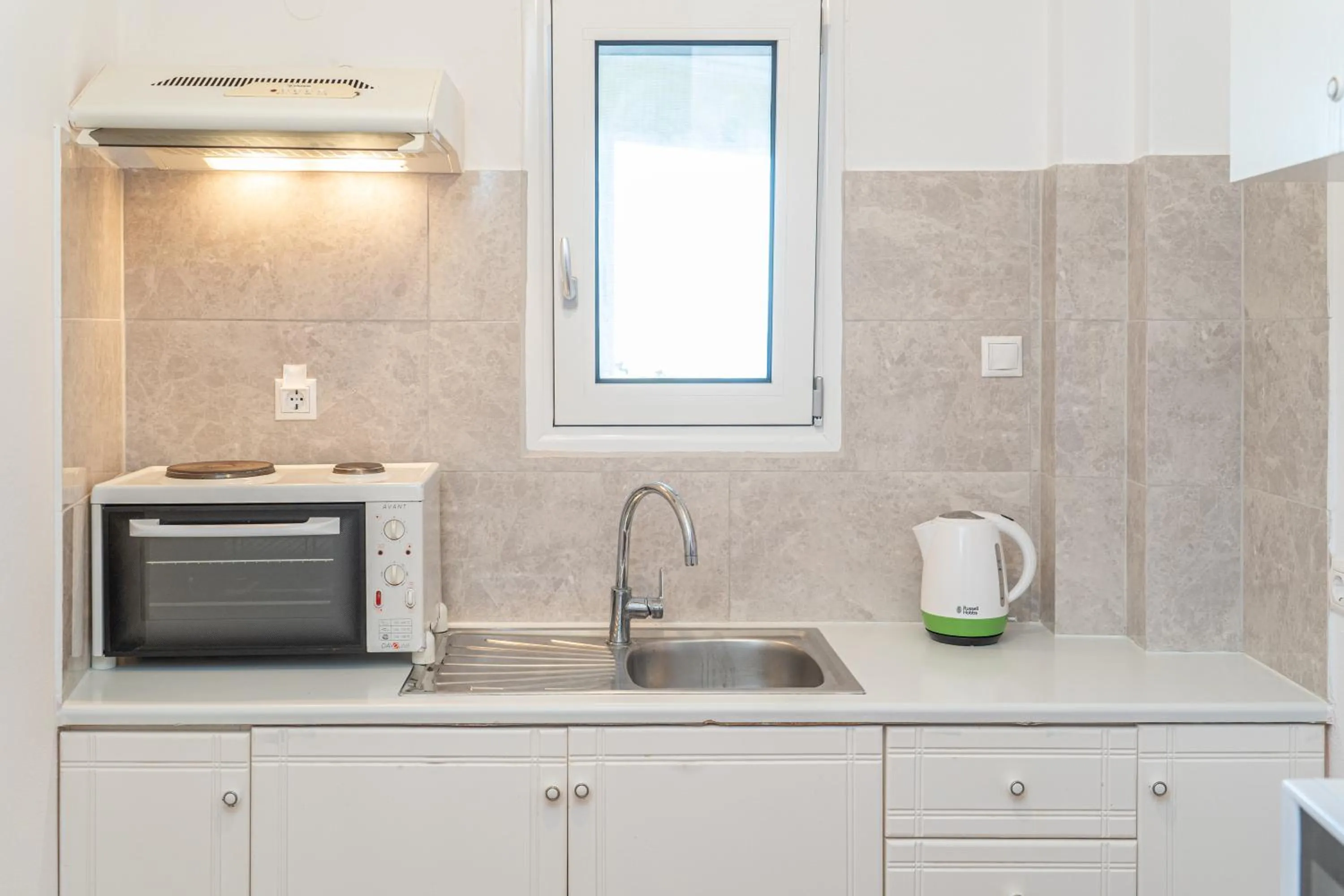 oven in Stella Hotel Apartments