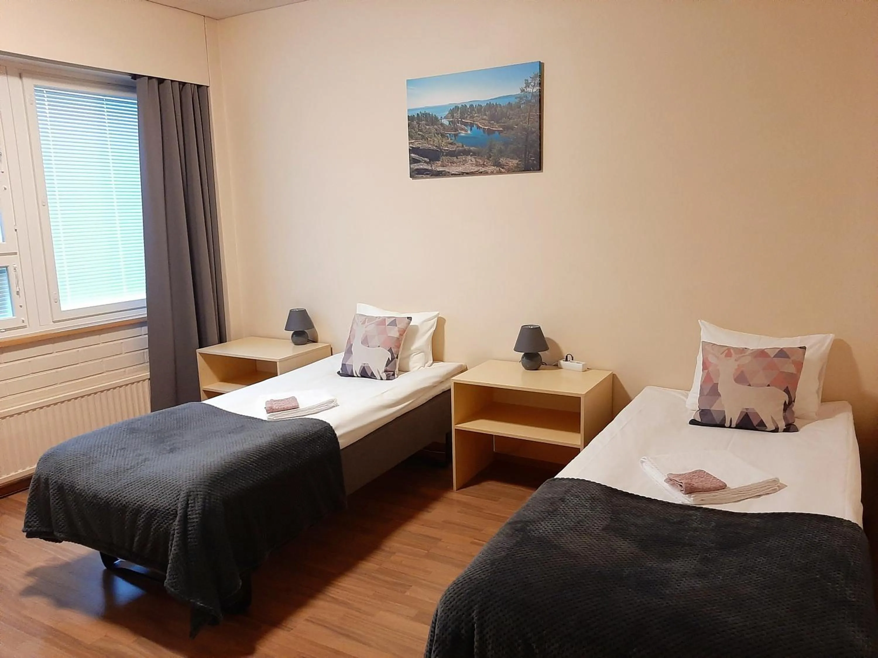 Photo of the whole room, Bed in Hotelli Kaatrahovi