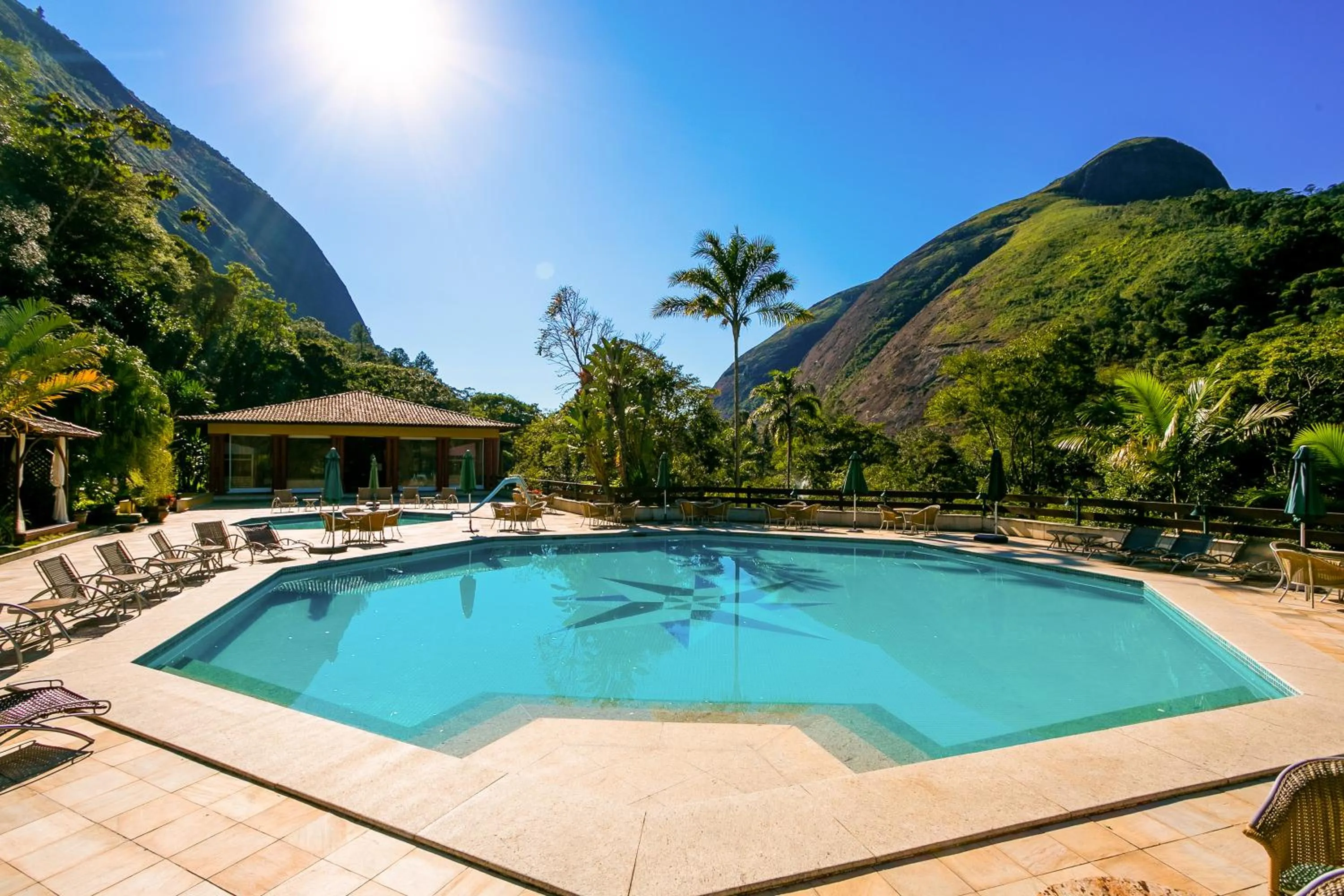 Swimming pool in Bomtempo II Chales by Castelo Itaipava