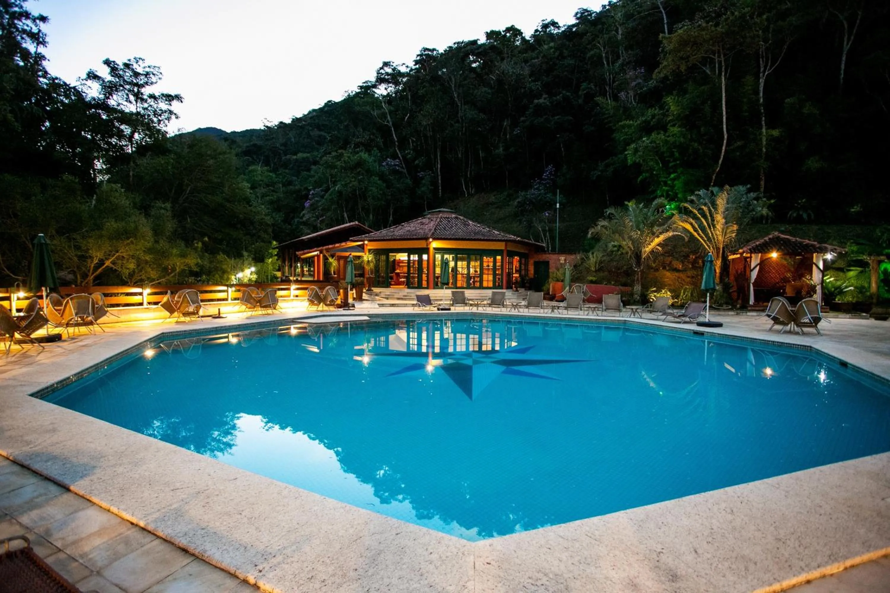 Swimming pool in Bomtempo II Chales by Castelo Itaipava