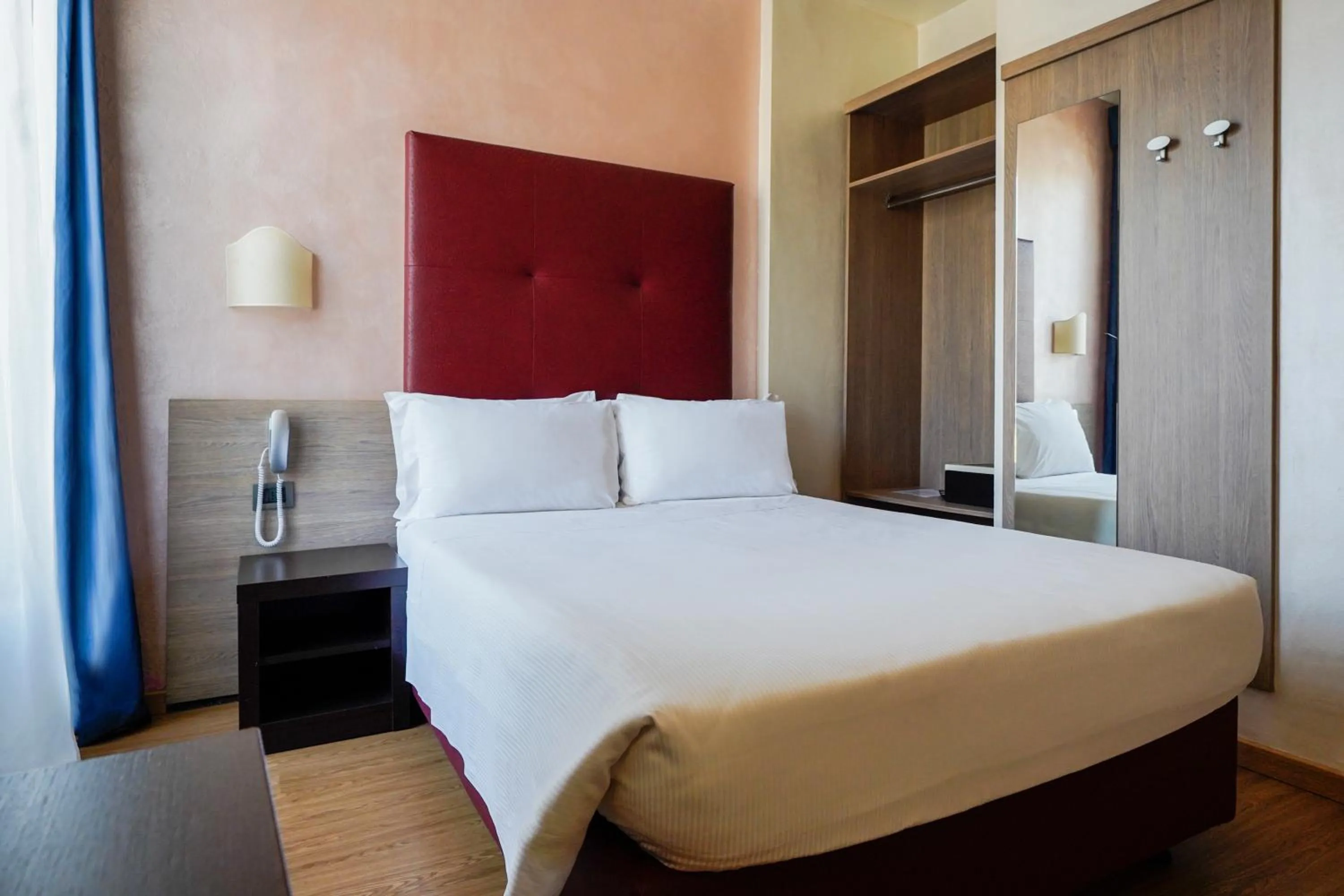 Bed in Hotel Panizza