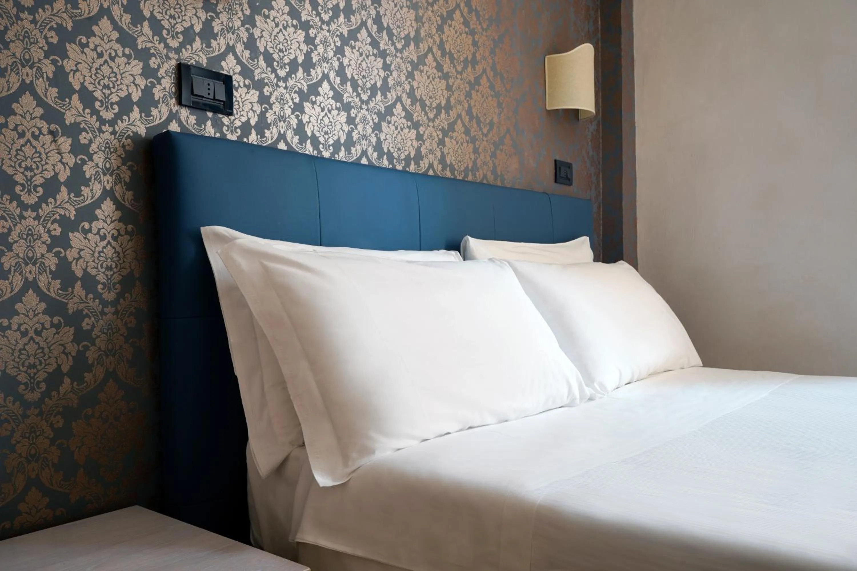 Bed in Hotel Panizza