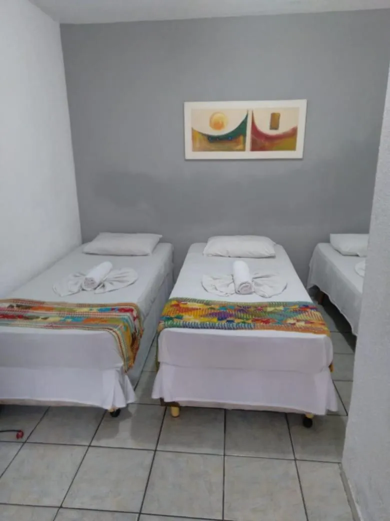 Bed in Pousada Nossa Casa