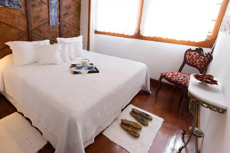 Bed in Pousada Arte Urquijo