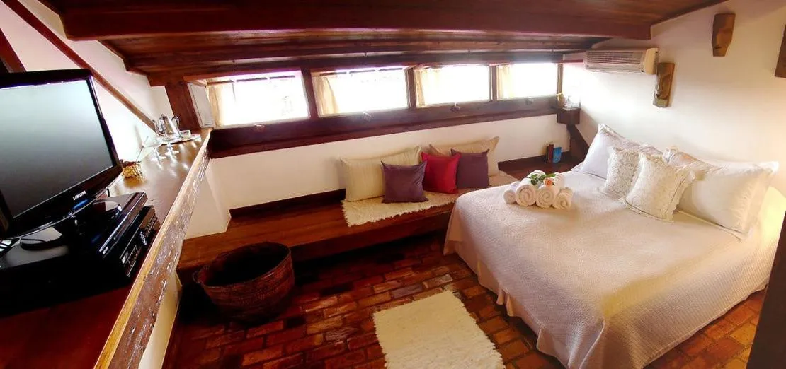 Bed in Pousada Arte Urquijo