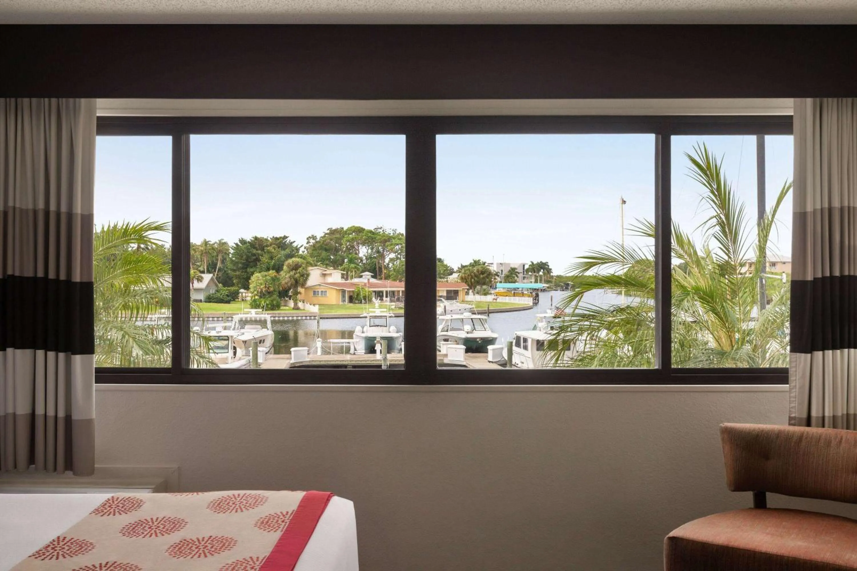 Photo of the whole room, Bed in Ramada by Wyndham Sarasota Waterfront